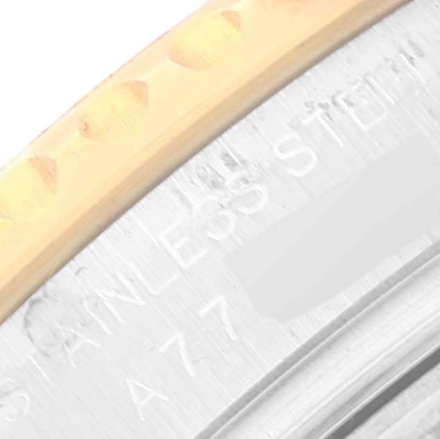 The image shows a close-up of the bezel and part of the stainless steel casing of a Rolex Yacht-Master 169623 Women's Steel and Gold (two tone) Blue Dial 169623 Women's Steel and Gold (two tone) Blue Dial watch, highlighting engraved text.