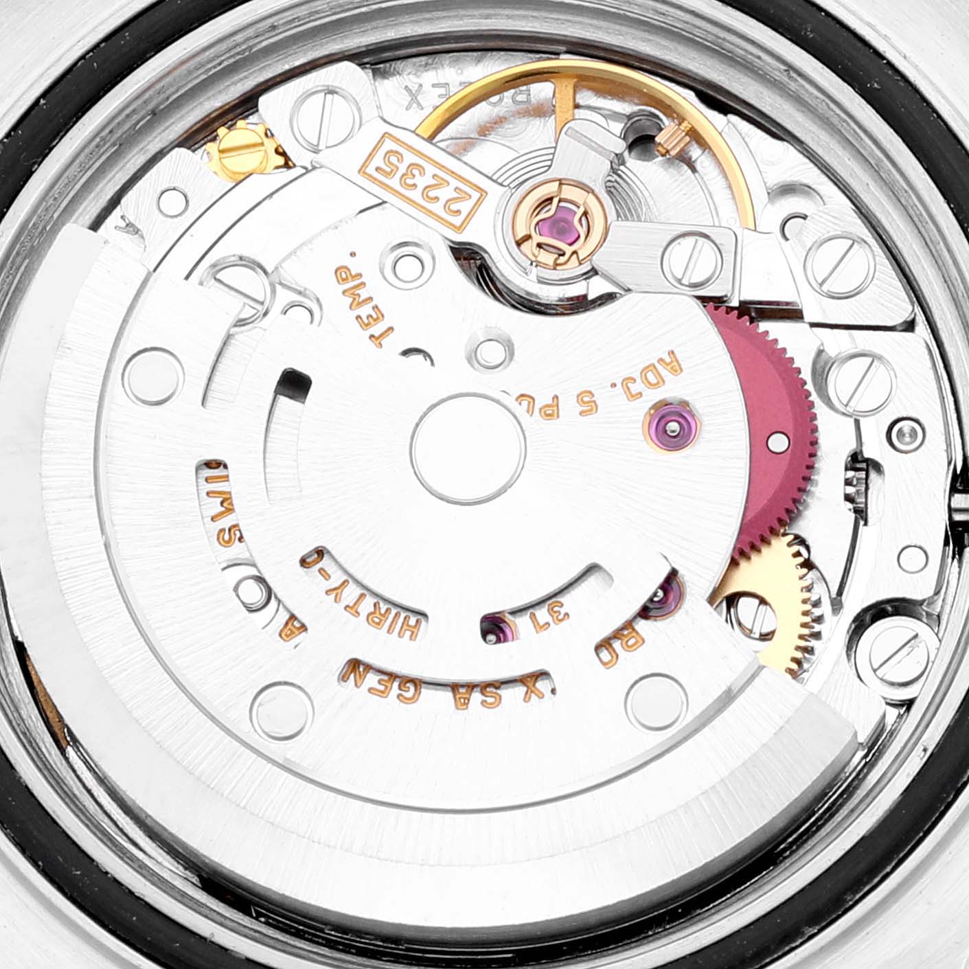 This image shows a close-up view of the movement of a Rolex Yacht-Master 169623 Women's Steel and Gold (two tone) Blue Dial 169623 Women's Steel and Gold (two tone) Blue Dial watch, highlighting its intricate internal mechanics.