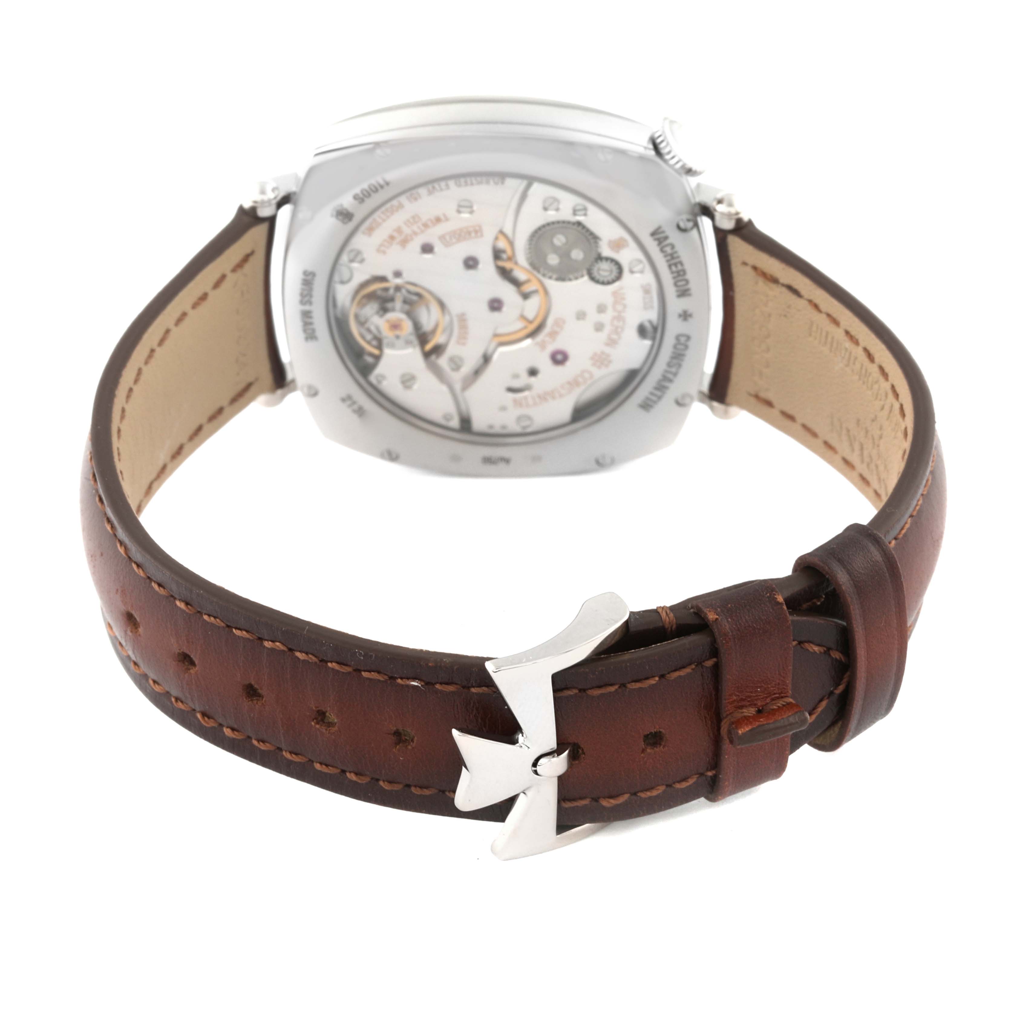 This image shows the Vacheron Constantin Historiques 1100S/000G-B734 Men's White Gold Silver Dial 1100S/000G-B734 Men's White Gold Silver Dial watch from the back, highlighting its movement and brown leather strap with a distinctive clasp.