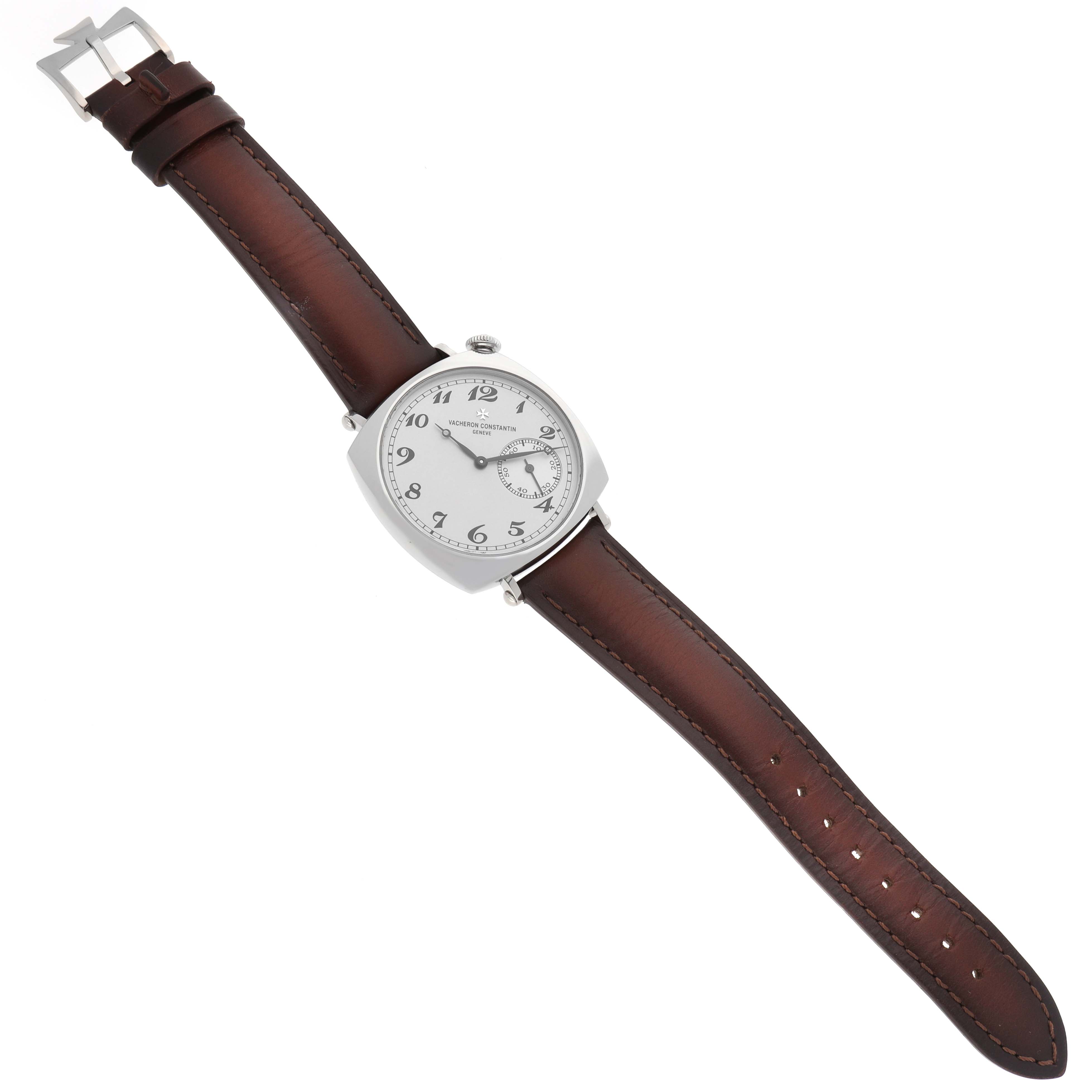 The image shows a Vacheron Constantin Historiques 1100S/000G-B734 Men's White Gold Silver Dial 1100S/000G-B734 Men's White Gold Silver Dial model watch with a silver dial, brown leather strap, and visible buckle, from an angled top-down view.