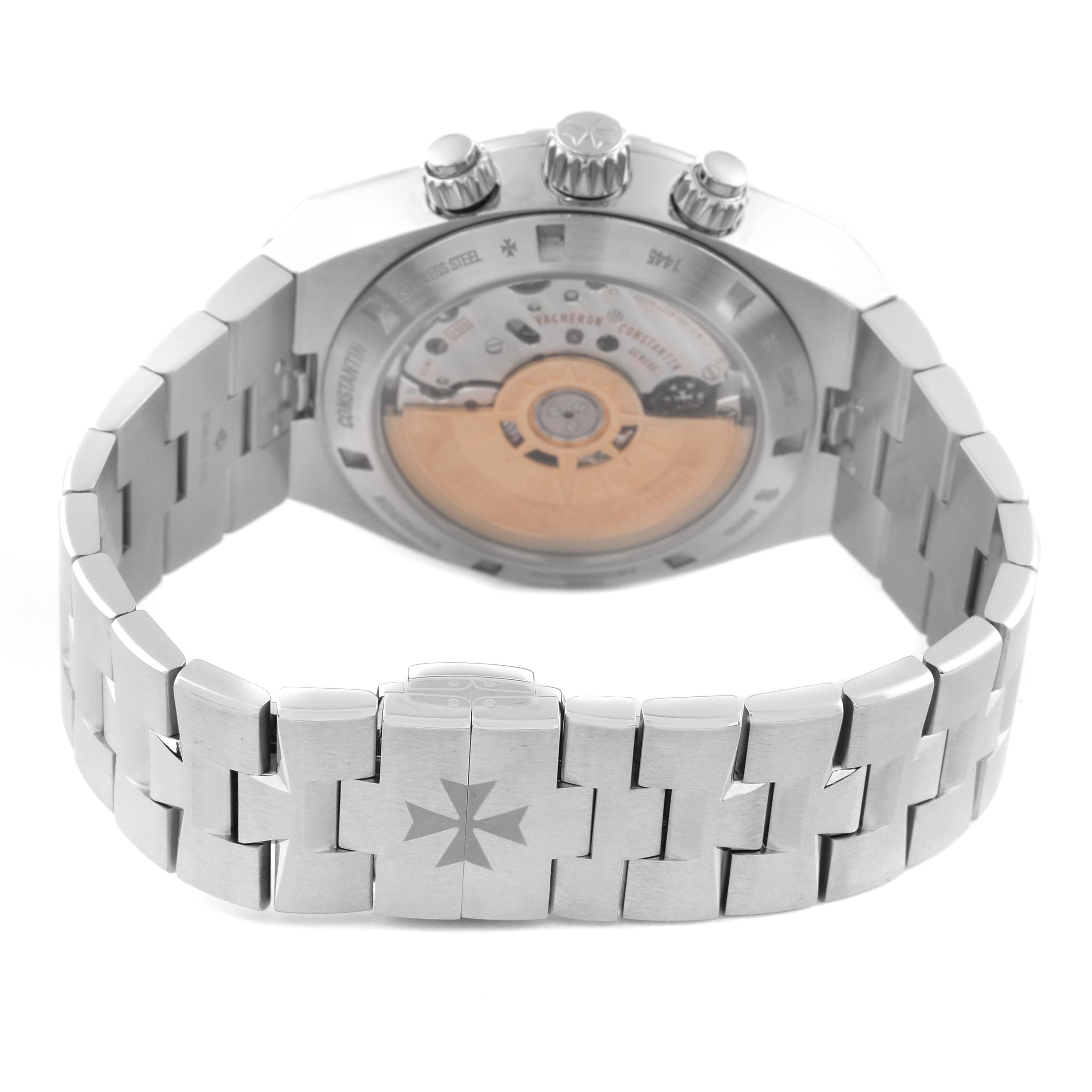 The image shows the back view of the Vacheron Constantin Overseas 5500V/110A-B481 Men's Stainless Steel Black Dial 5500V/110A-B481 Men's Stainless Steel Black Dial watch, highlighting the movement and bracelet.