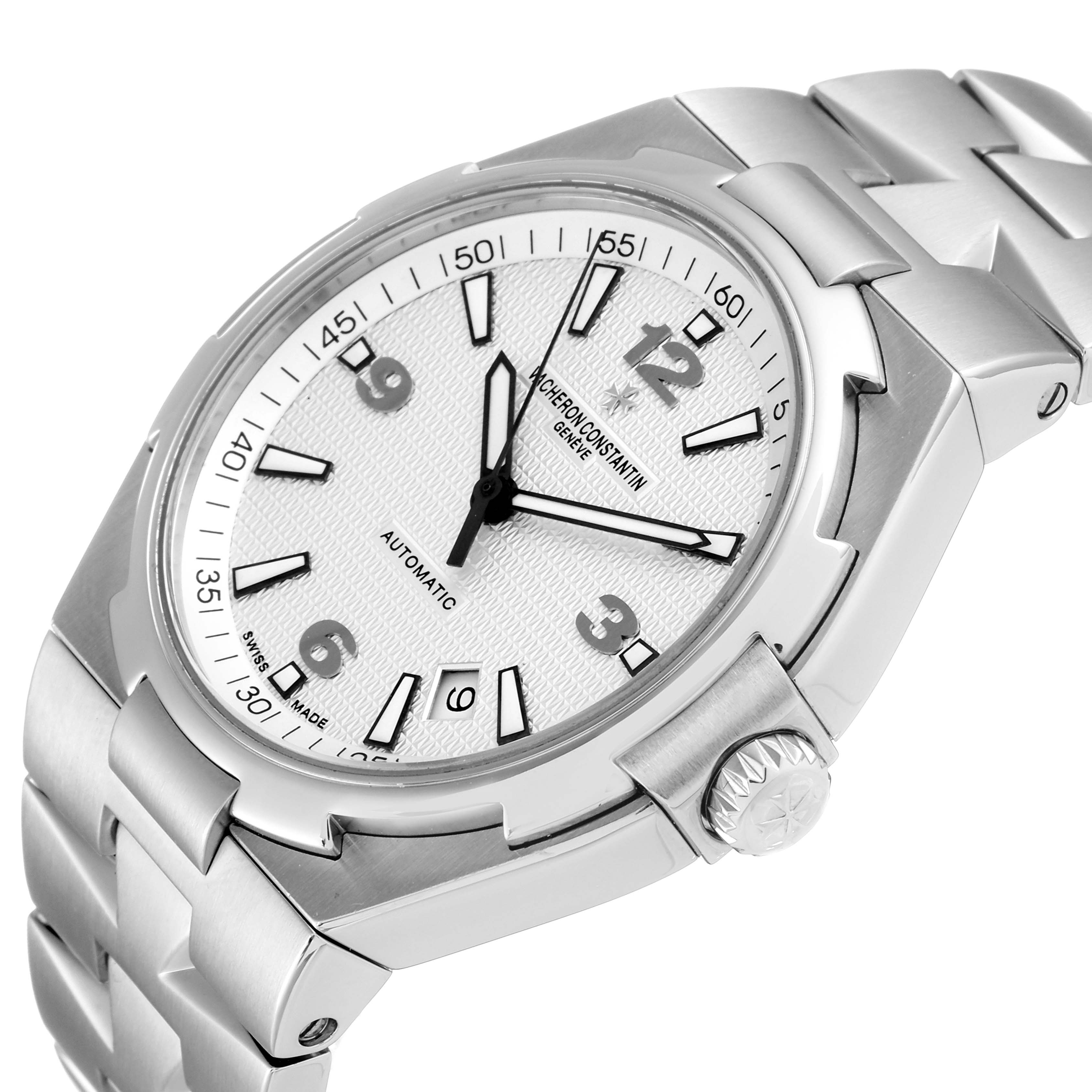 The image shows a Vacheron Constantin Overseas 47040B01A-9093 Men's Stainless Steel Silver Dial 47040B01A-9093 Men's Stainless Steel Silver Dial model watch at an angled close-up, featuring the face, bezel, crown, and part of the bracelet.