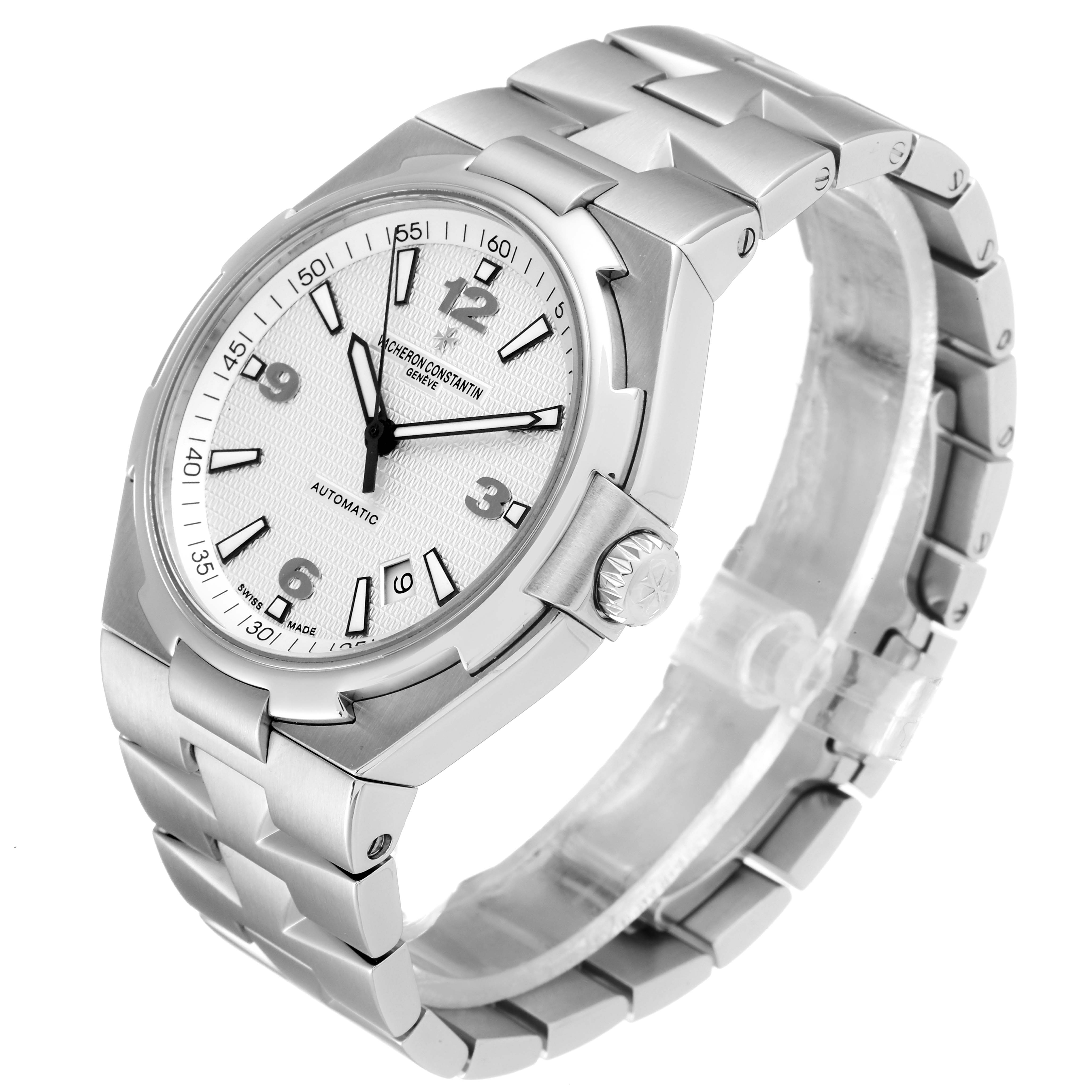 The image shows a Vacheron Constantin Overseas 47040B01A-9093 Men's Stainless Steel Silver Dial 47040B01A-9093 Men's Stainless Steel Silver Dial model watch at a three-quarter angle, highlighting the face, bezel, crown, and bracelet.