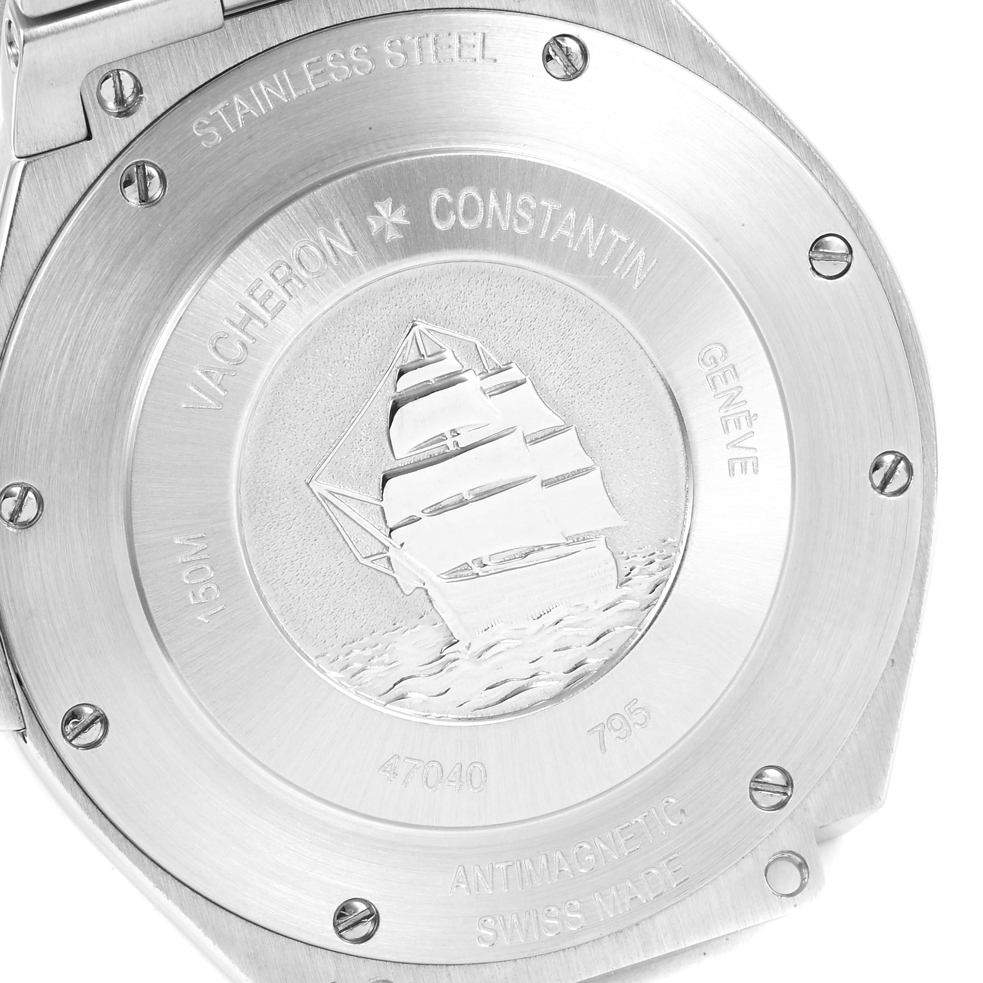 The image shows the stainless steel case back of a Vacheron Constantin Overseas 47040B01A-9093 Men's Stainless Steel Silver Dial 47040B01A-9093 Men's Stainless Steel Silver Dial watch, featuring an engraved ship.