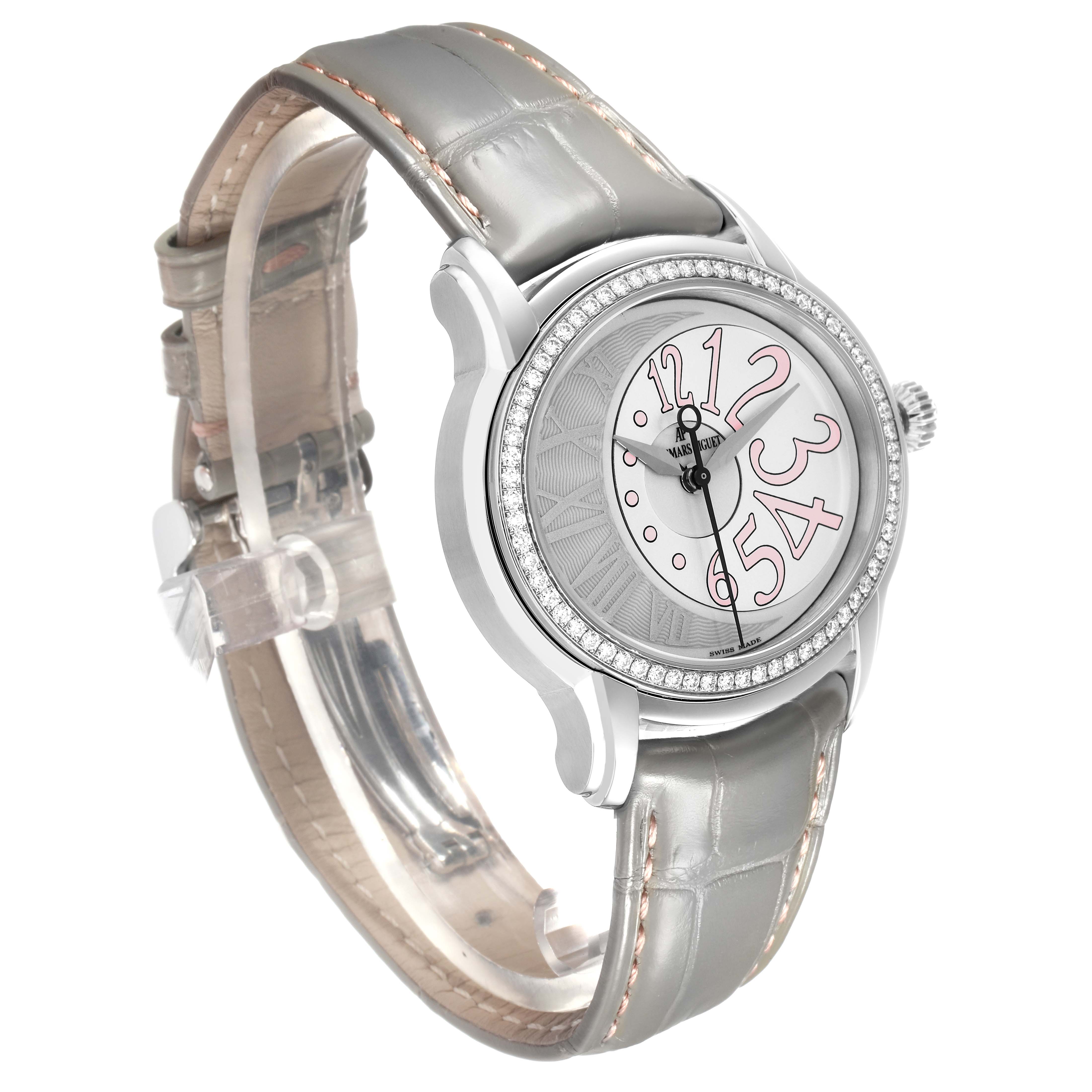 The Audemars Piguet Millenary 77301ST Women
s Stainless Steel Grey Dial watch is angled to show the face, bezel with diamonds, crown, and part of the leather strap.