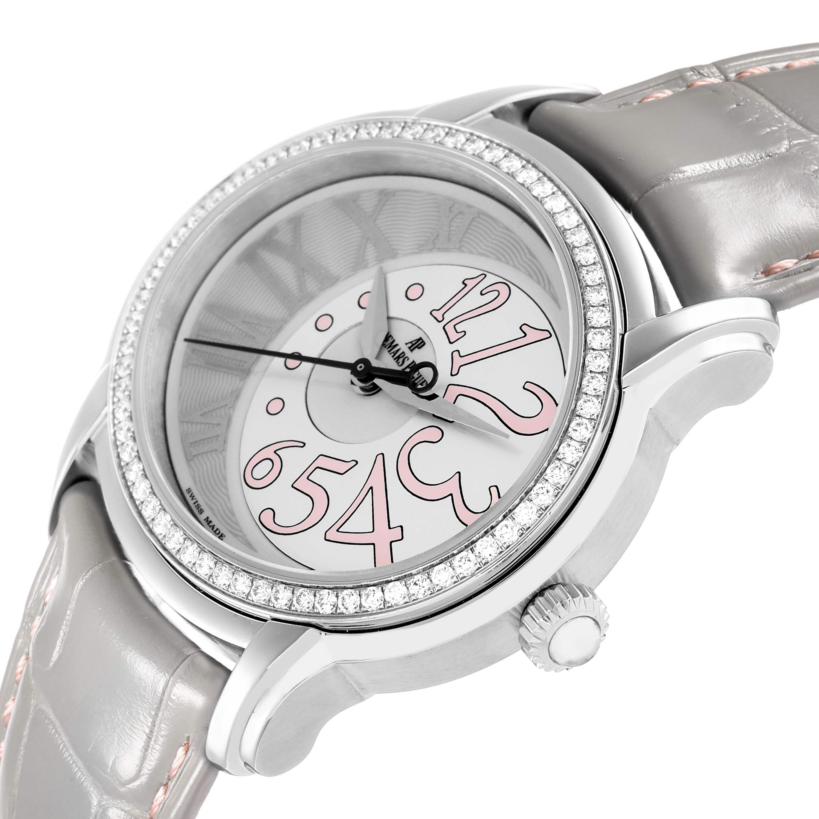 The Audemars Piguet Millenary 77301ST Women
s Stainless Steel Grey Dial watch is shown at an angle highlighting the bezel, dial with pink numerals, and grey strap.