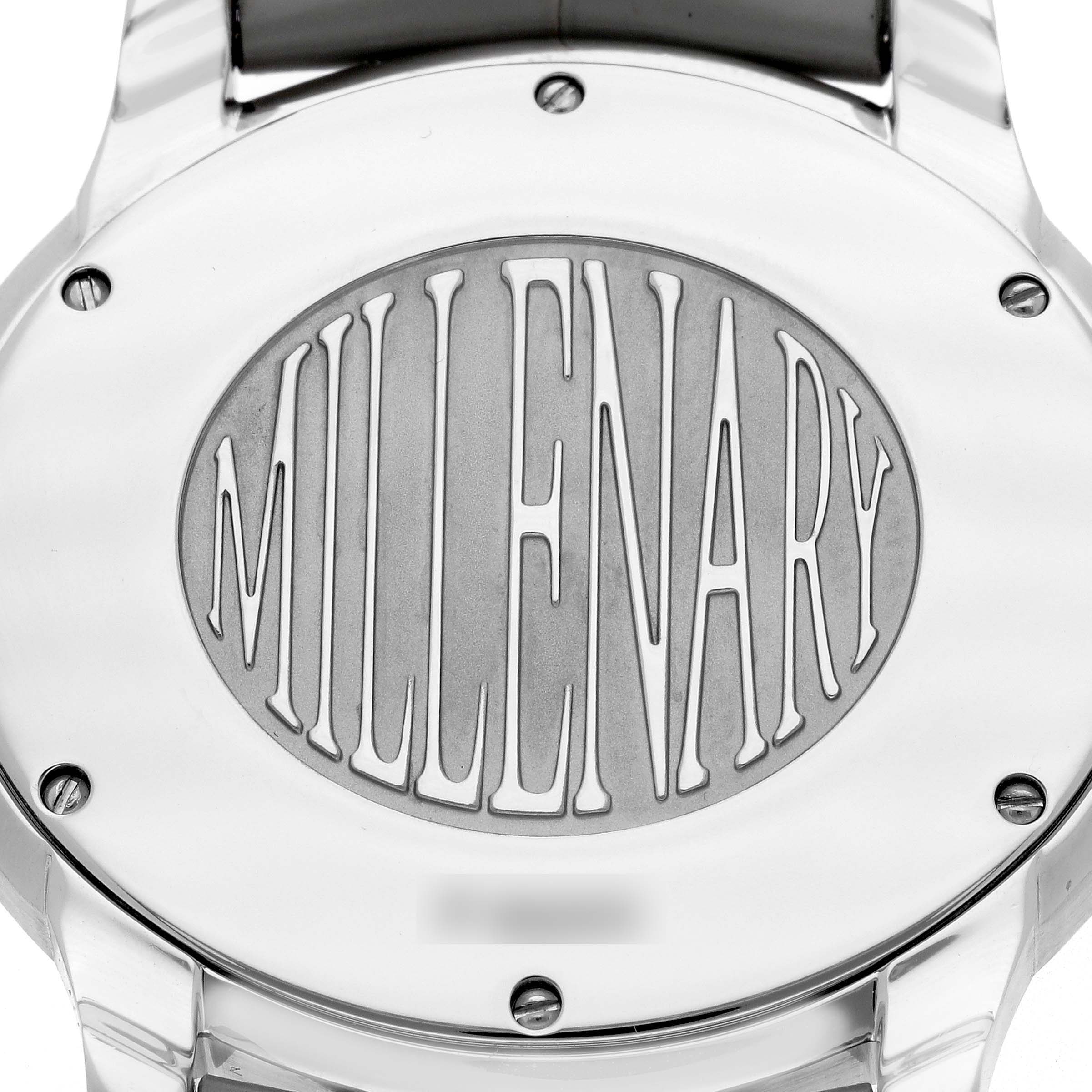 The image shows the case back of an Audemars Piguet Millenary 77301ST Women
s Stainless Steel Grey Dial watch, featuring an engraved "MILLENARY" logo.