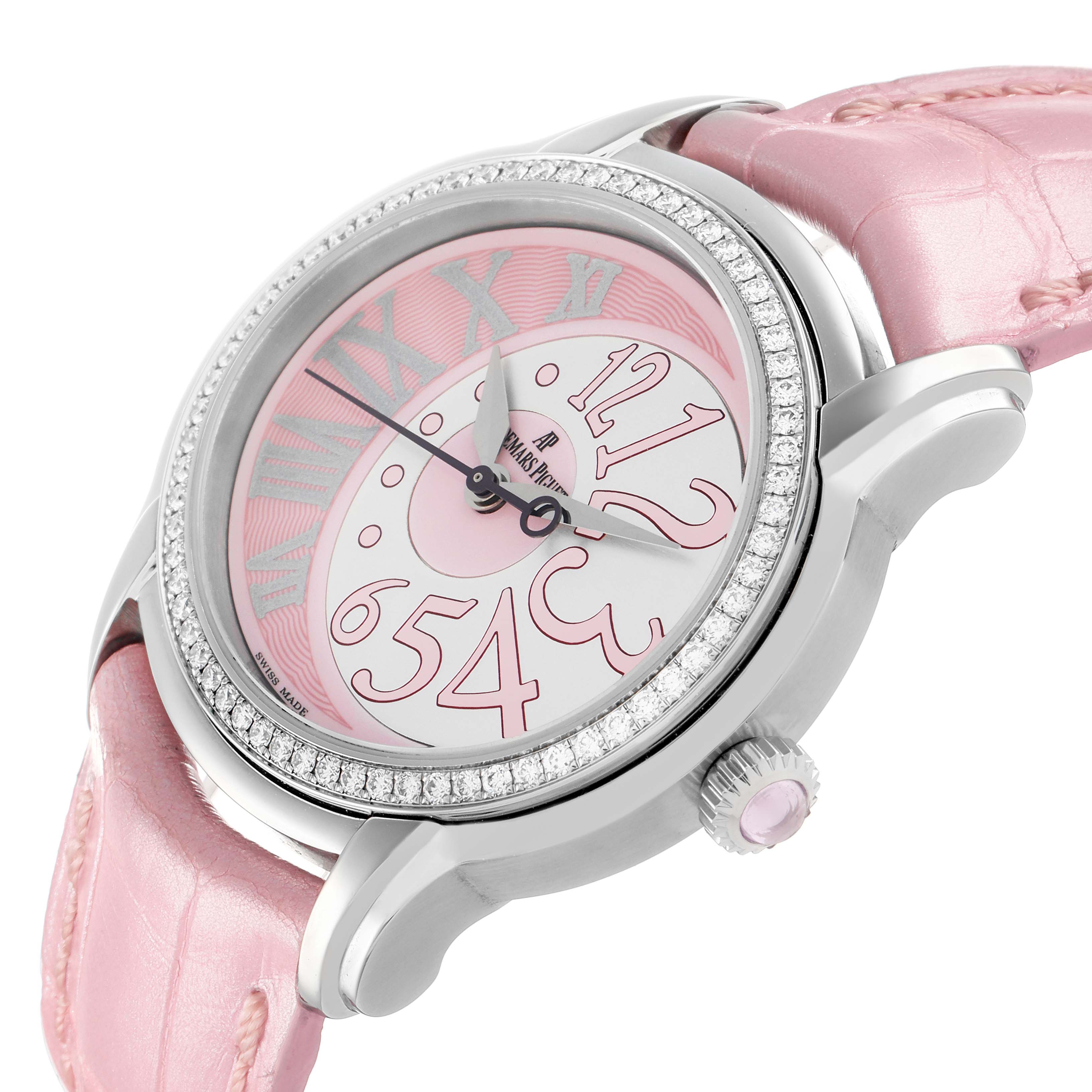 The Audemars Piguet Millenary 77301ST Women
s Stainless Steel Pink Dial watch is shown at an angled view, highlighting the pink dial, diamond bezel, and pink leather strap.