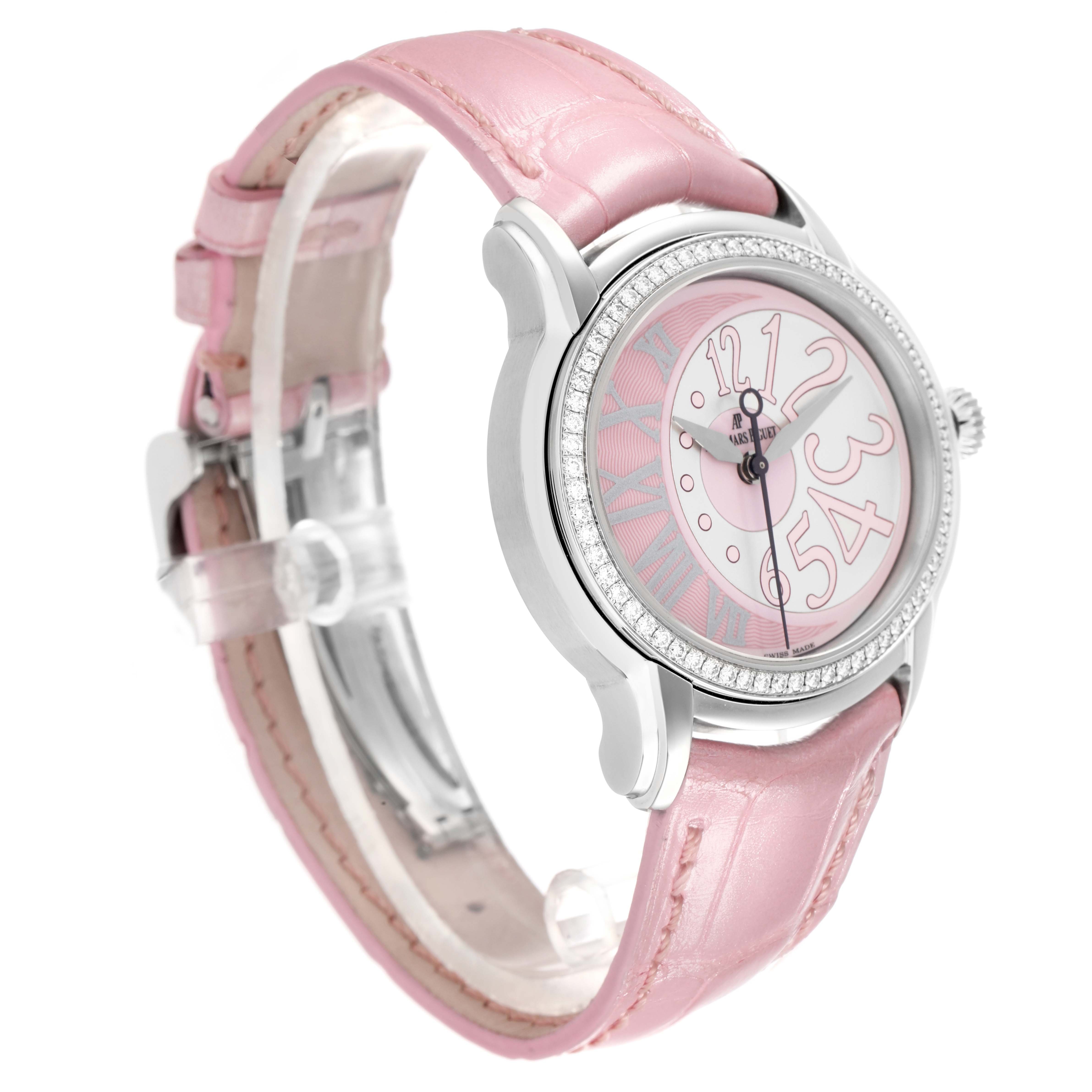 The Audemars Piguet Millenary 77301ST Women
s Stainless Steel Pink Dial watch is shown from a side angle, highlighting its pink strap, silver case, and dial details.