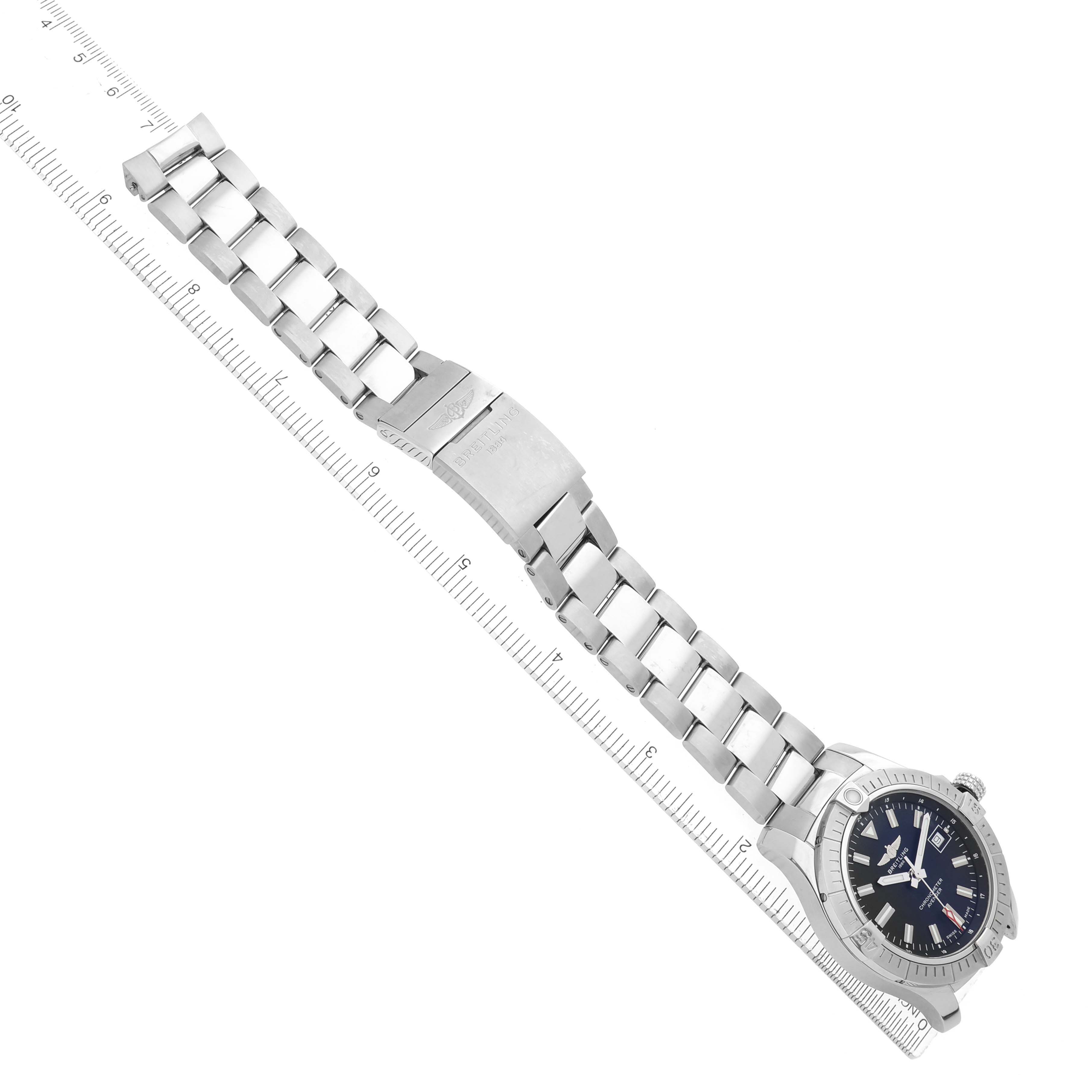 The Breitling Avenger A17318 Men
s Stainless Steel Black Dial watch is shown from an angled top view, displaying the face, bezel, crown, and full metal bracelet.