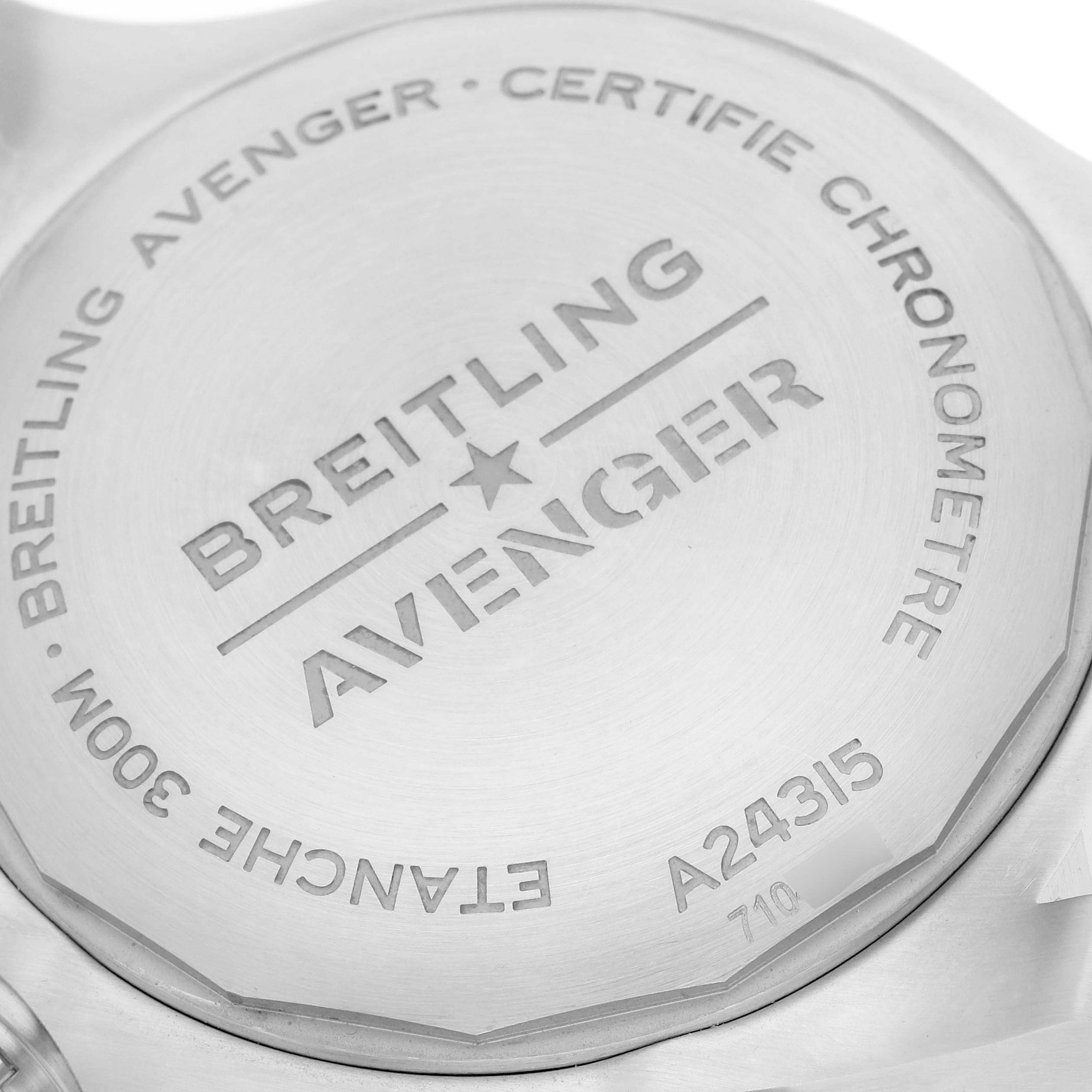 The image shows the case back of a Breitling Avenger A24315 Men
s Stainless Steel Blue Dial, highlighting engravings and model details.