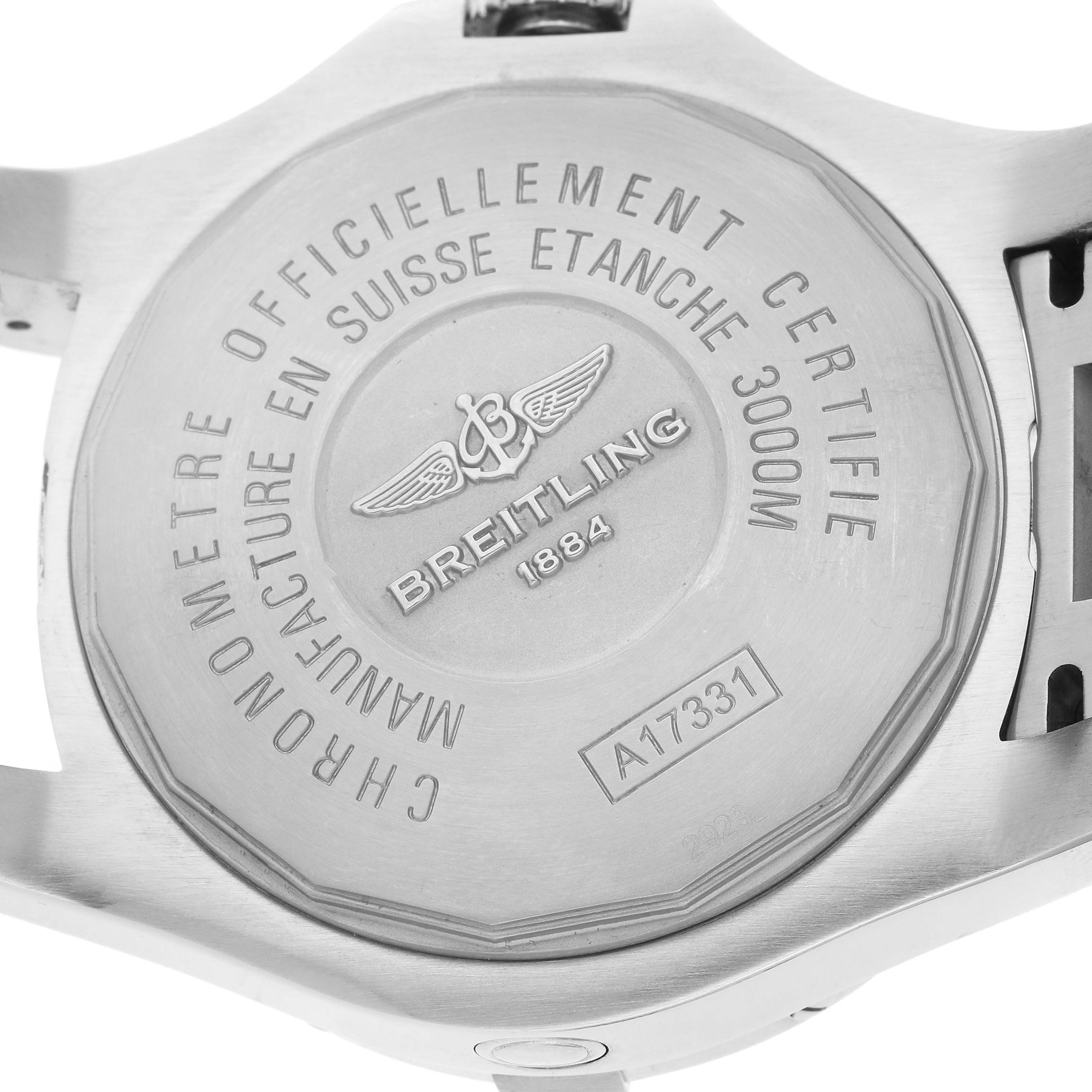 The image shows the back case of a Breitling Avenger A17331 Men
s Stainless Steel Black Dial watch, highlighting the engraving and certification details.