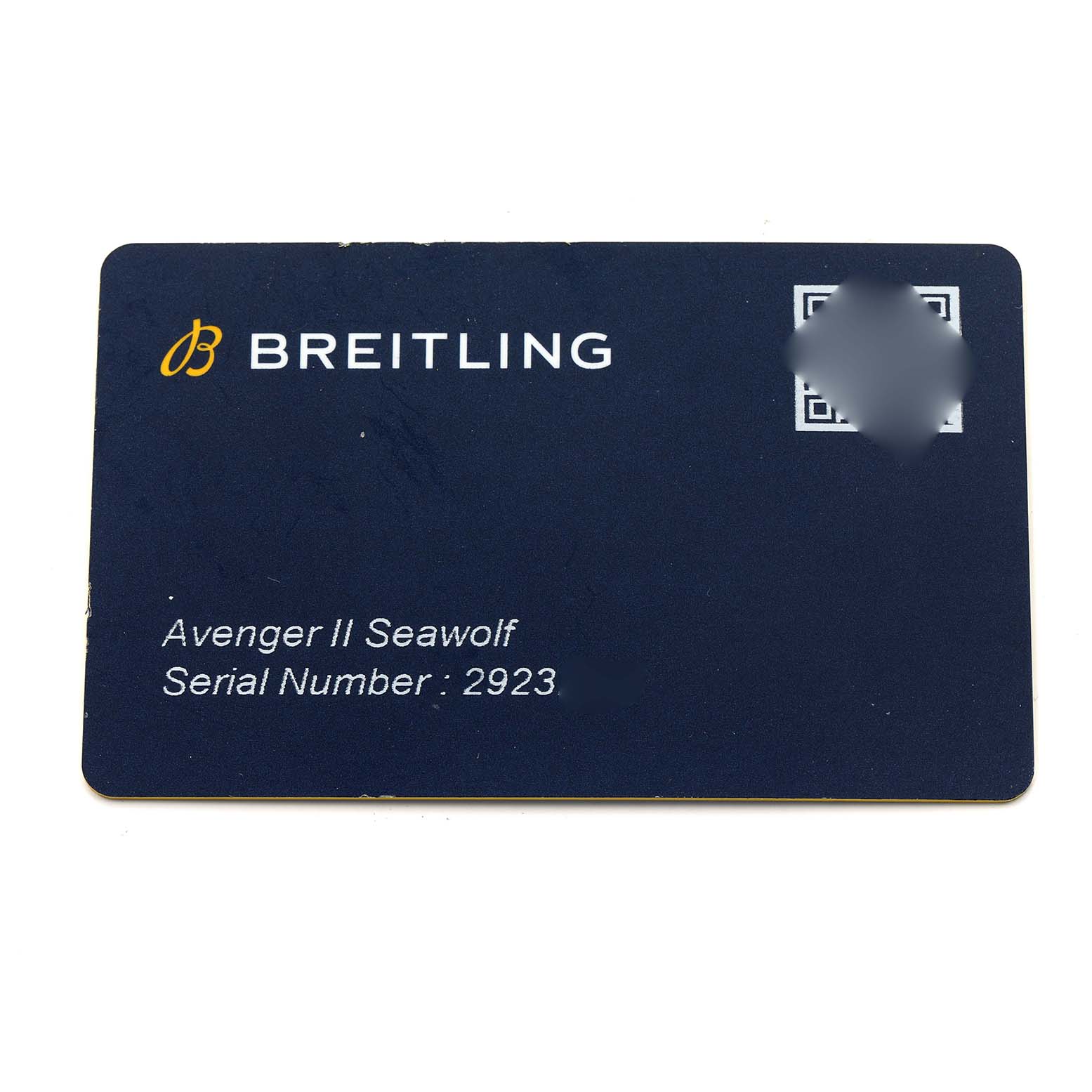 The image shows a Breitling Avenger A17331 Men
s Stainless Steel Black Dial II Seawolf warranty card, displaying the model name and serial number.