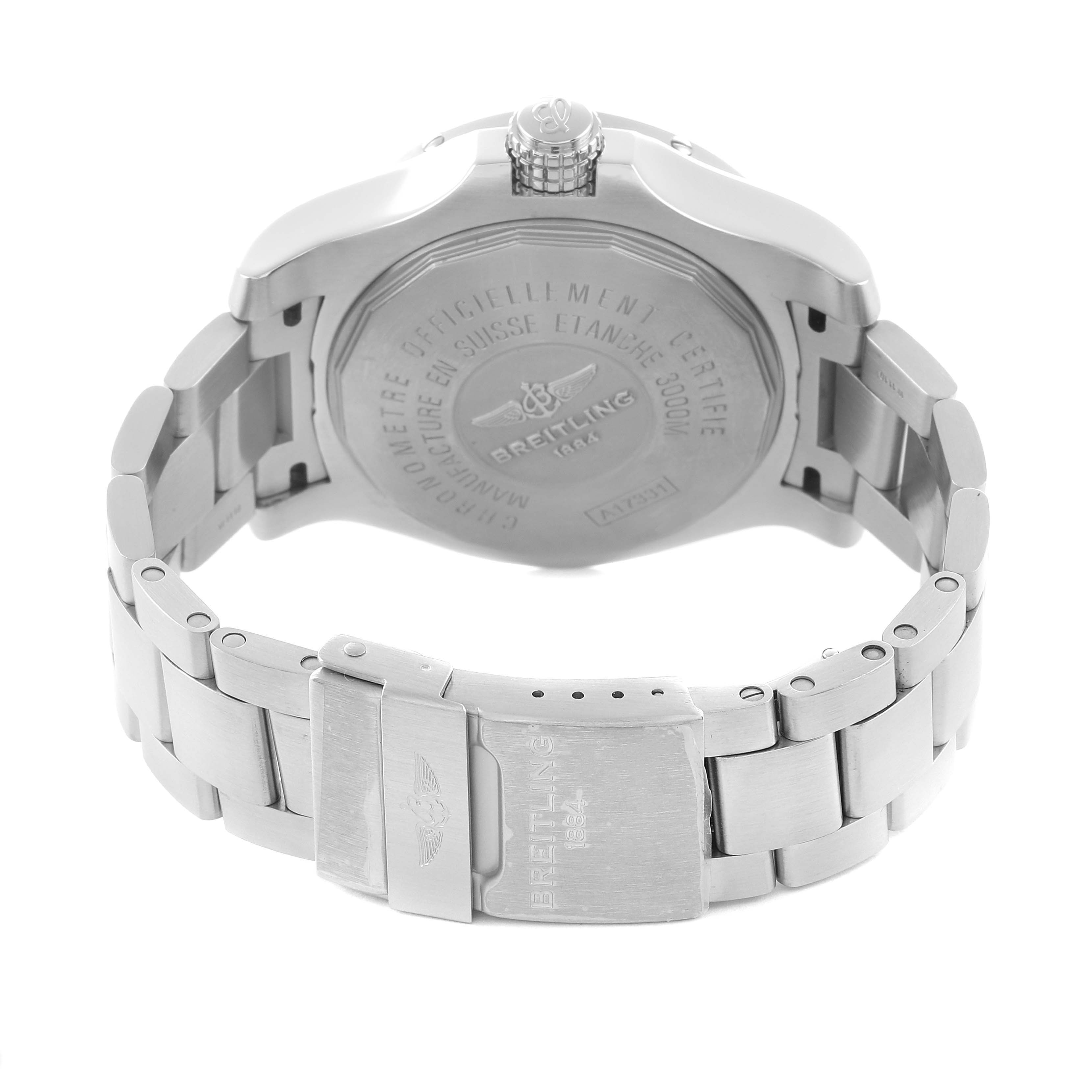 The image shows the back of a Breitling Avenger A17331 Men
s Stainless Steel Black Dial watch, highlighting the case back, bracelet, and clasp from a slightly elevated angle.