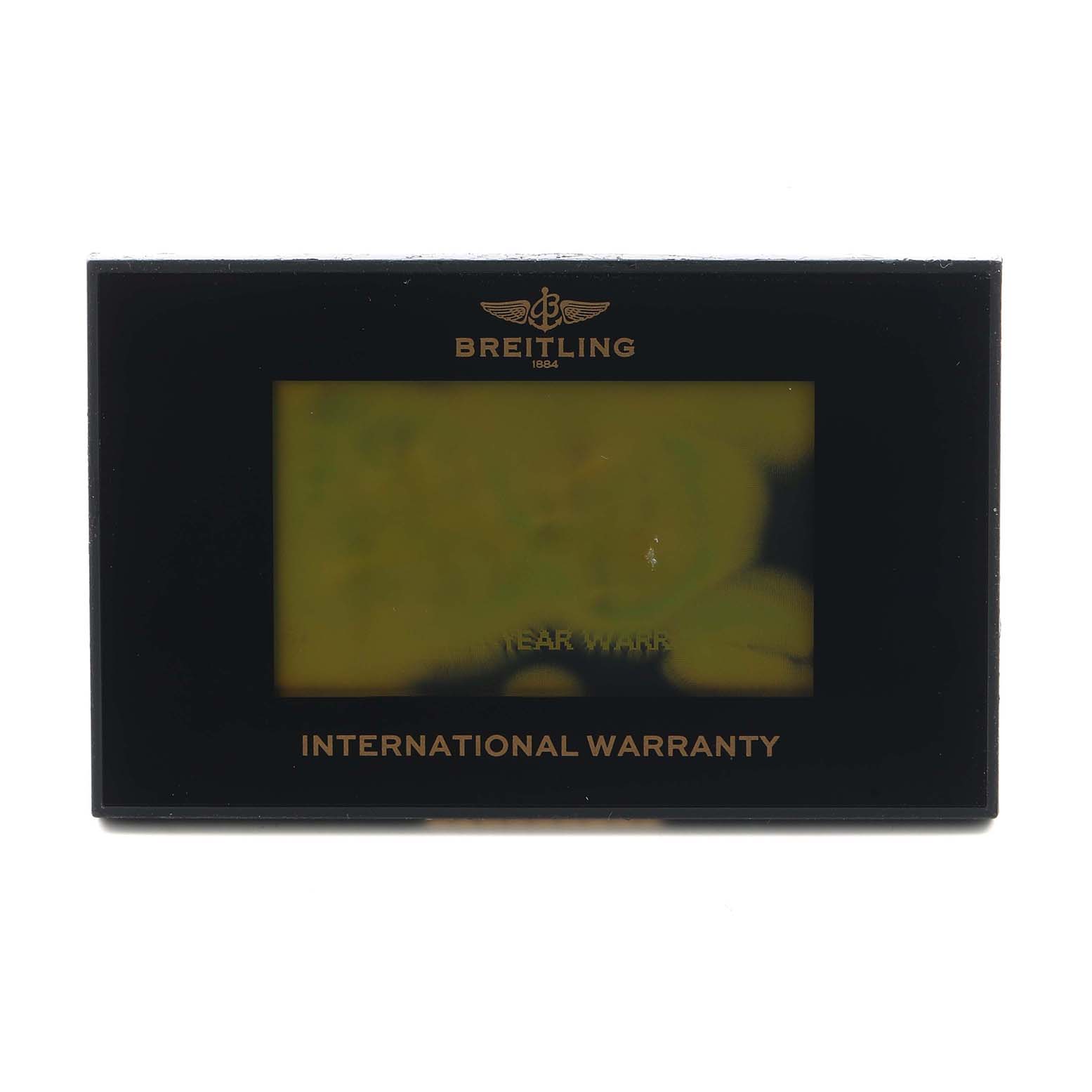 The image shows the International Warranty card for the Breitling Chronomat AB0111 Men
s Stainless Steel Black Dial watch, viewed from the front.