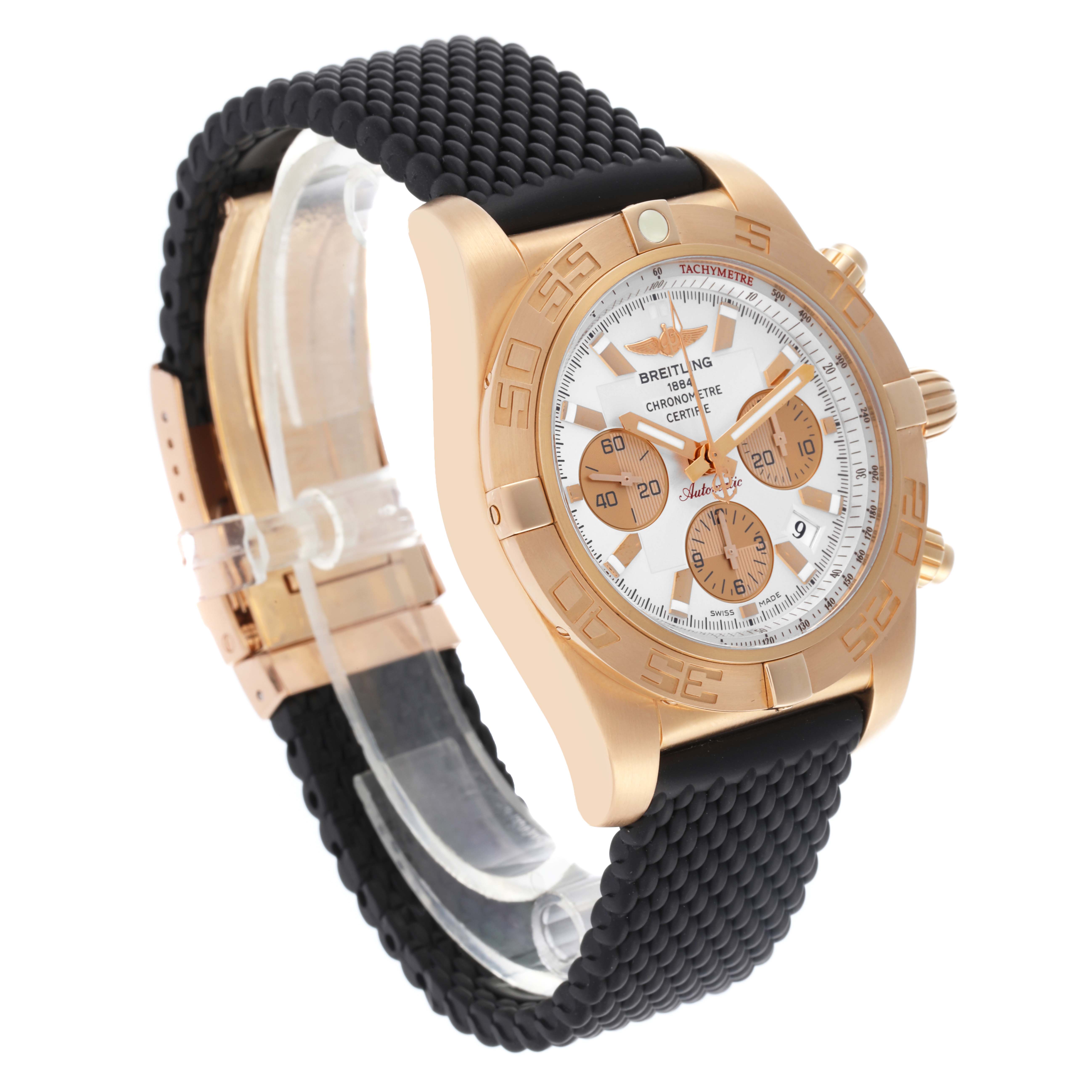 The Breitling Chronomat HB0110 Men's Rose Gold Silver Dial watch is shown at an angle highlighting the rose gold case, white dial, black strap, and side pushers.