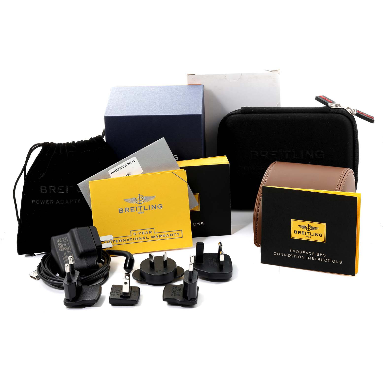 The image shows various accessories and packaging for the Breitling Professional Series VB5510 Men's Titanium Black Dial VB5510 Men's Titanium Black Dial watch, including international chargers and instruction booklets.