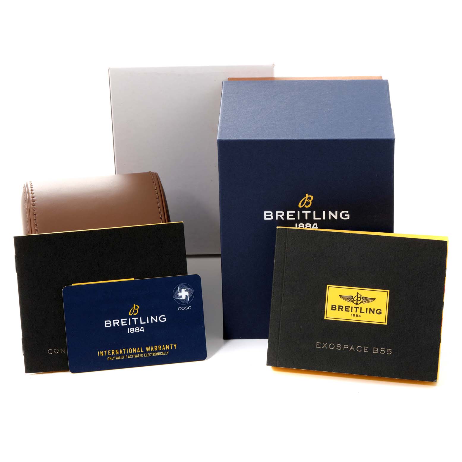 This image shows the box, warranty card, and manuals for the Professional Series model by Breitling.