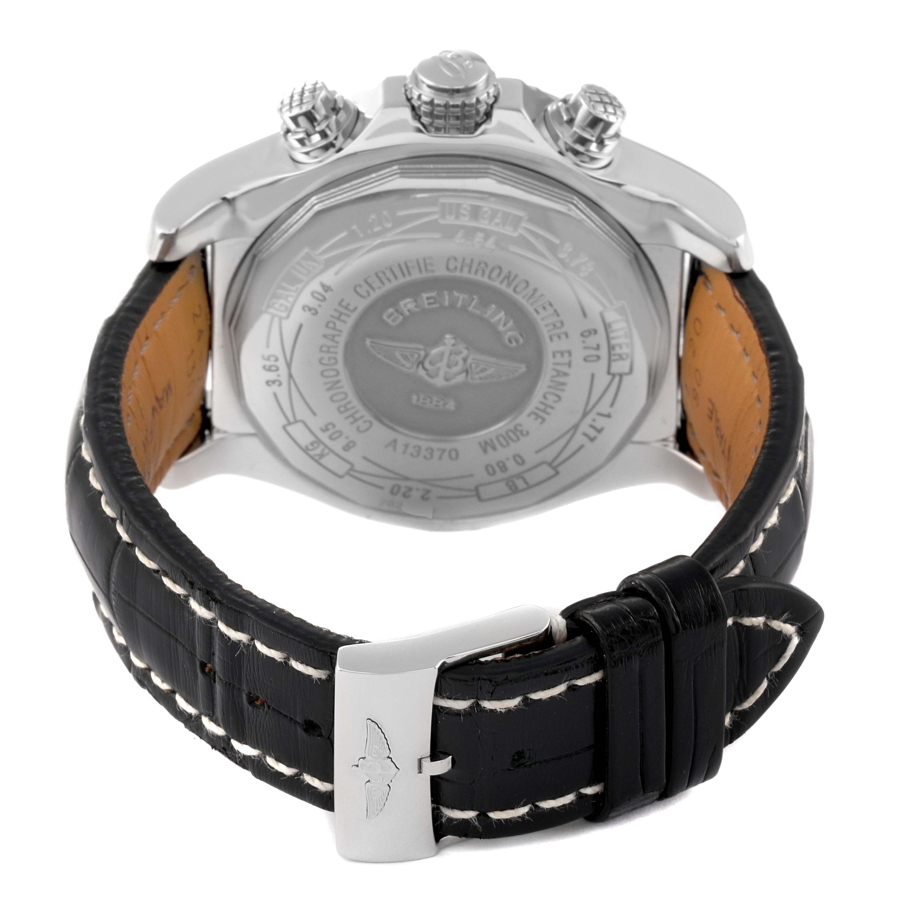 The image shows the back of a Breitling Avenger A13370 Men's Stainless Steel White Dial A13370 Men's Stainless Steel White Dial watch, displaying the case back, crown, pushers, and leather strap with stitching.
