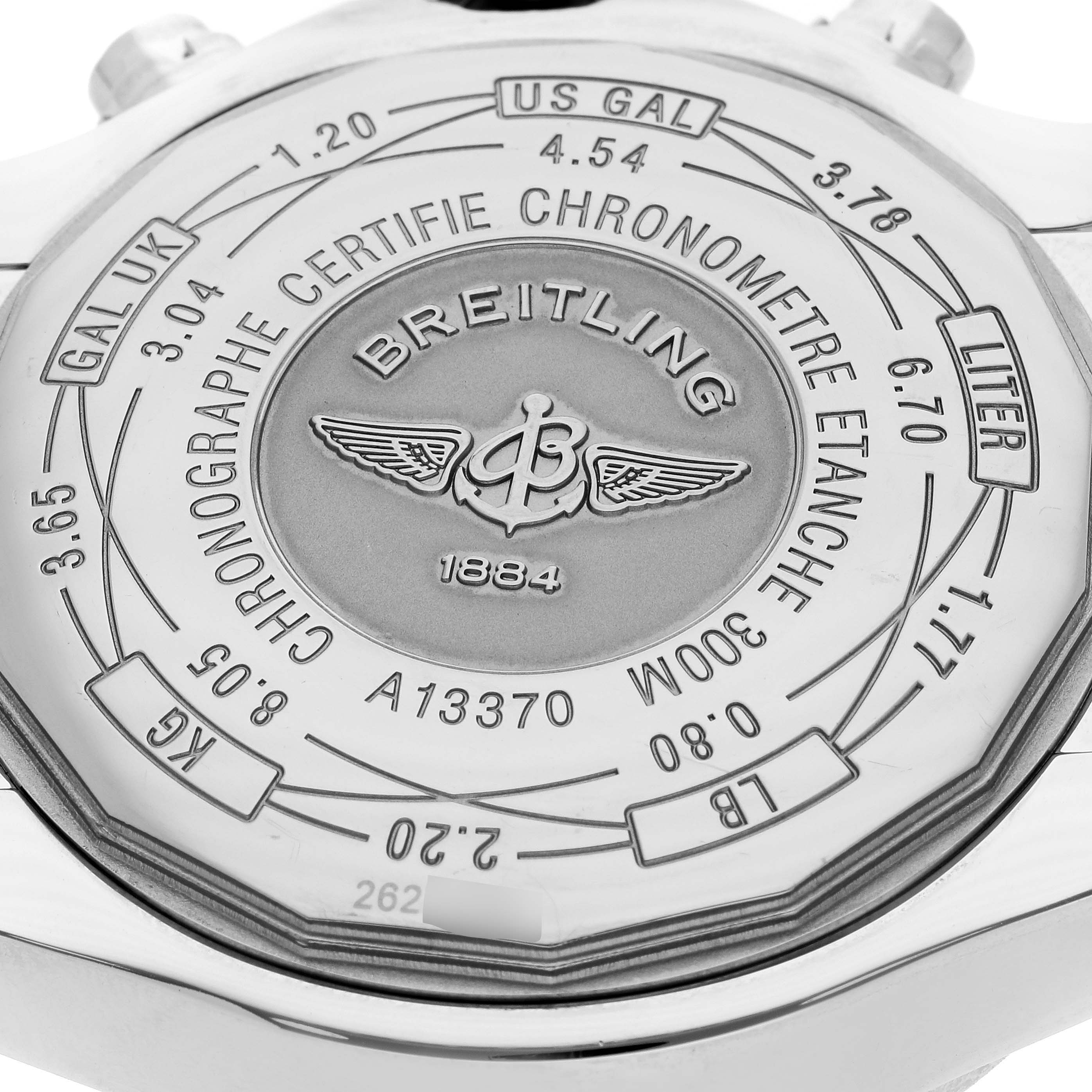 This image shows the back case of a Breitling Avenger A13370 Men's Stainless Steel White Dial A13370 Men's Stainless Steel White Dial watch, displaying various unit conversions and brand engravings.