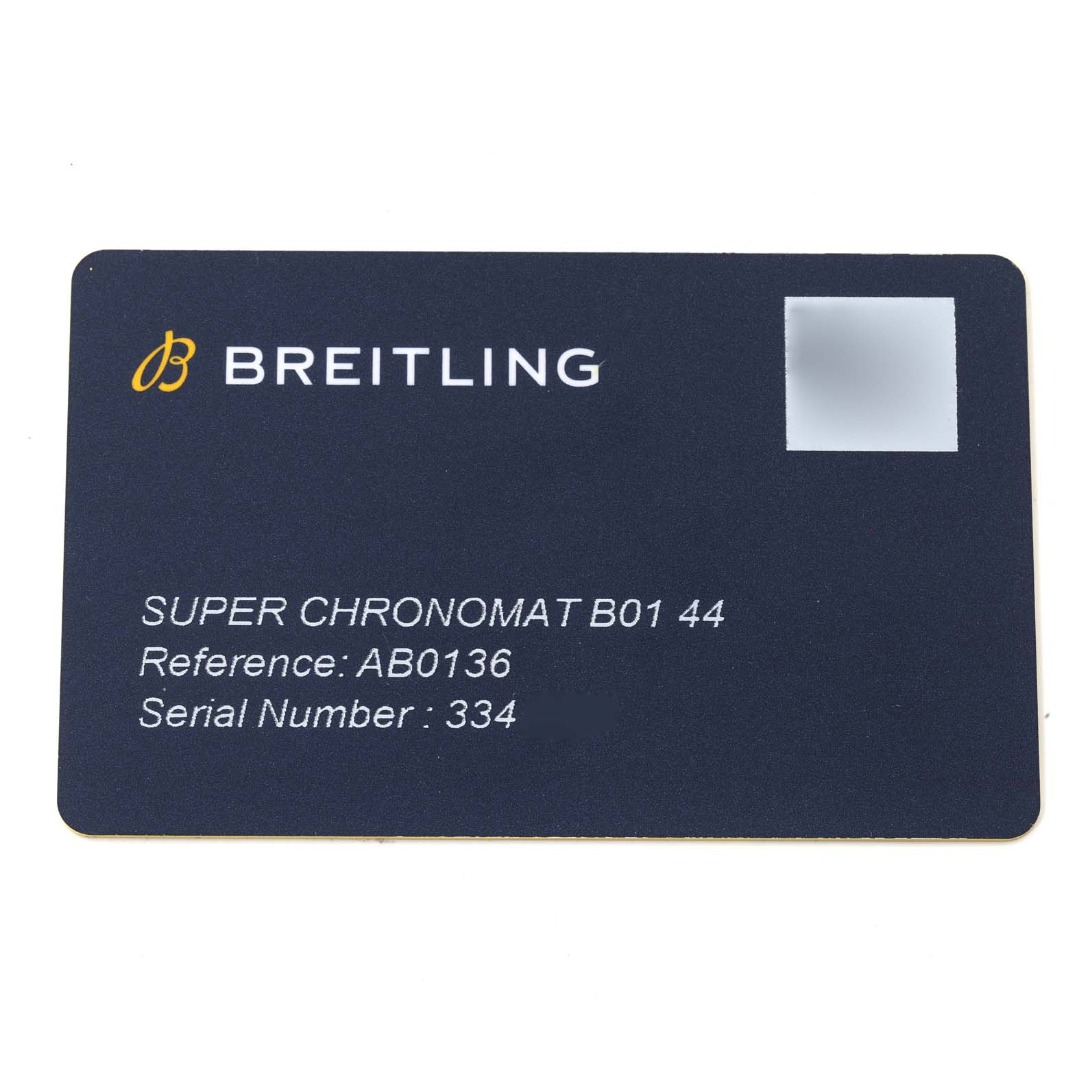 The image shows a warranty card for the Breitling Chronomat AB0136251B1A2 Men's Stainless Steel Blue Dial AB0136251B1A2 Men's Stainless Steel Blue Dial B01 44 watch, detailing its reference and serial number.