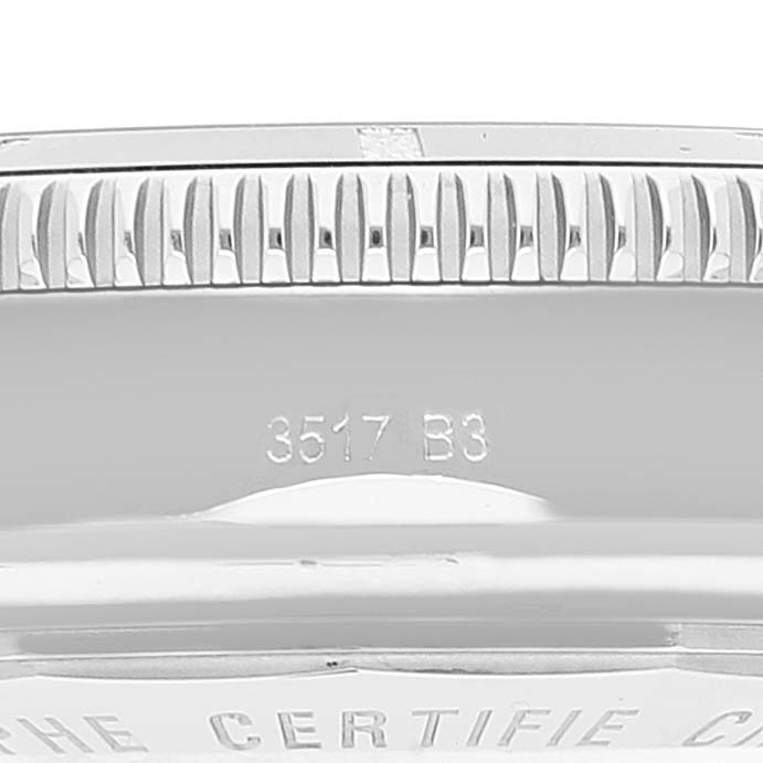 The image shows the side view of the Breitling Superocean A13312 Men
s Stainless Steel Black Dial watch, focusing on the bezel and engraved serial number.