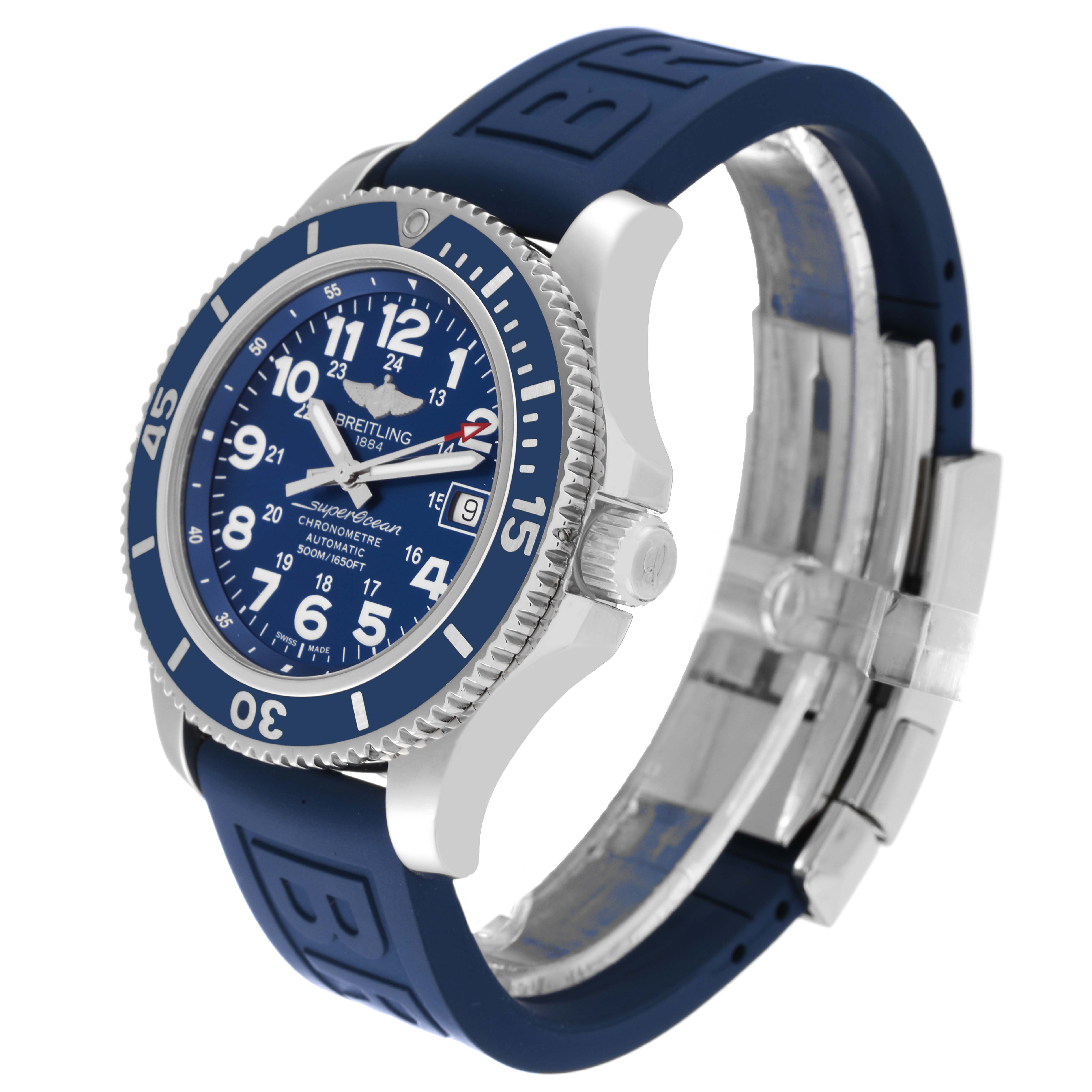 The watch is a Breitling Superocean A17365 Men's Stainless Steel Blue Dial A17365 Men's Stainless Steel Blue Dial model with a blue dial and rubber strap, shown at a three-quarter angle.