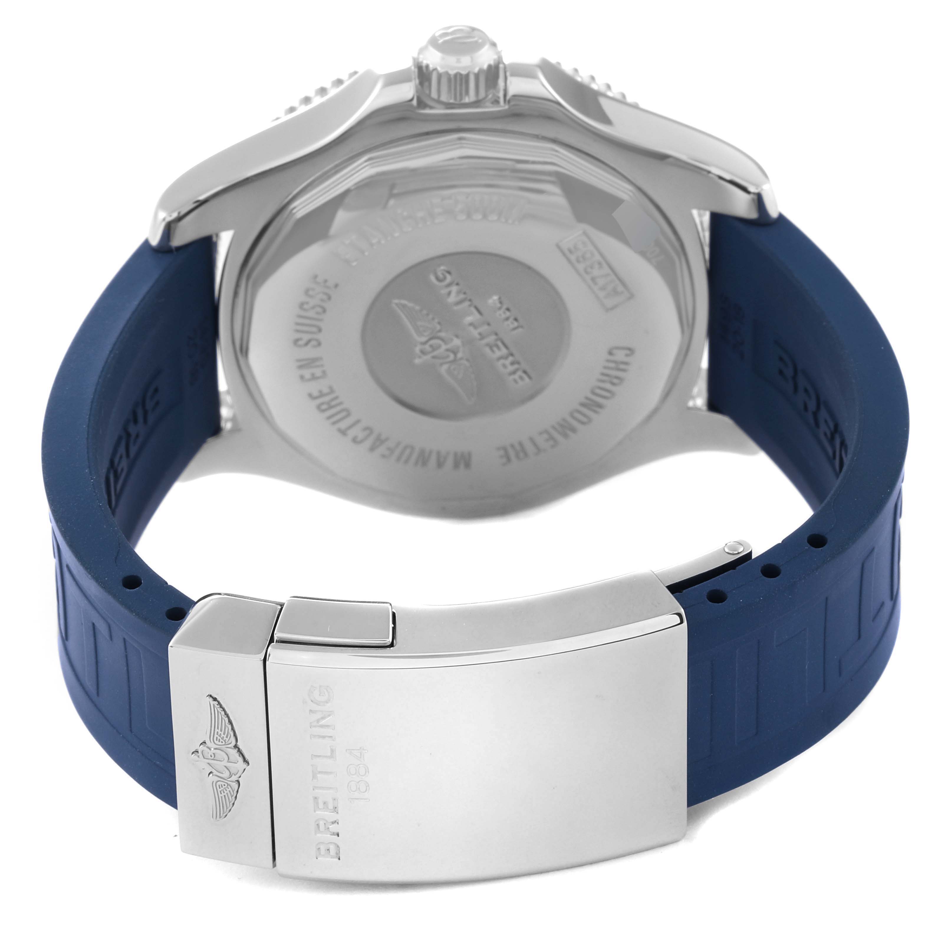 The image shows the backside of a Breitling Superocean A17365 Men's Stainless Steel Blue Dial A17365 Men's Stainless Steel Blue Dial watch, focusing on the case back and blue strap with a metal clasp.