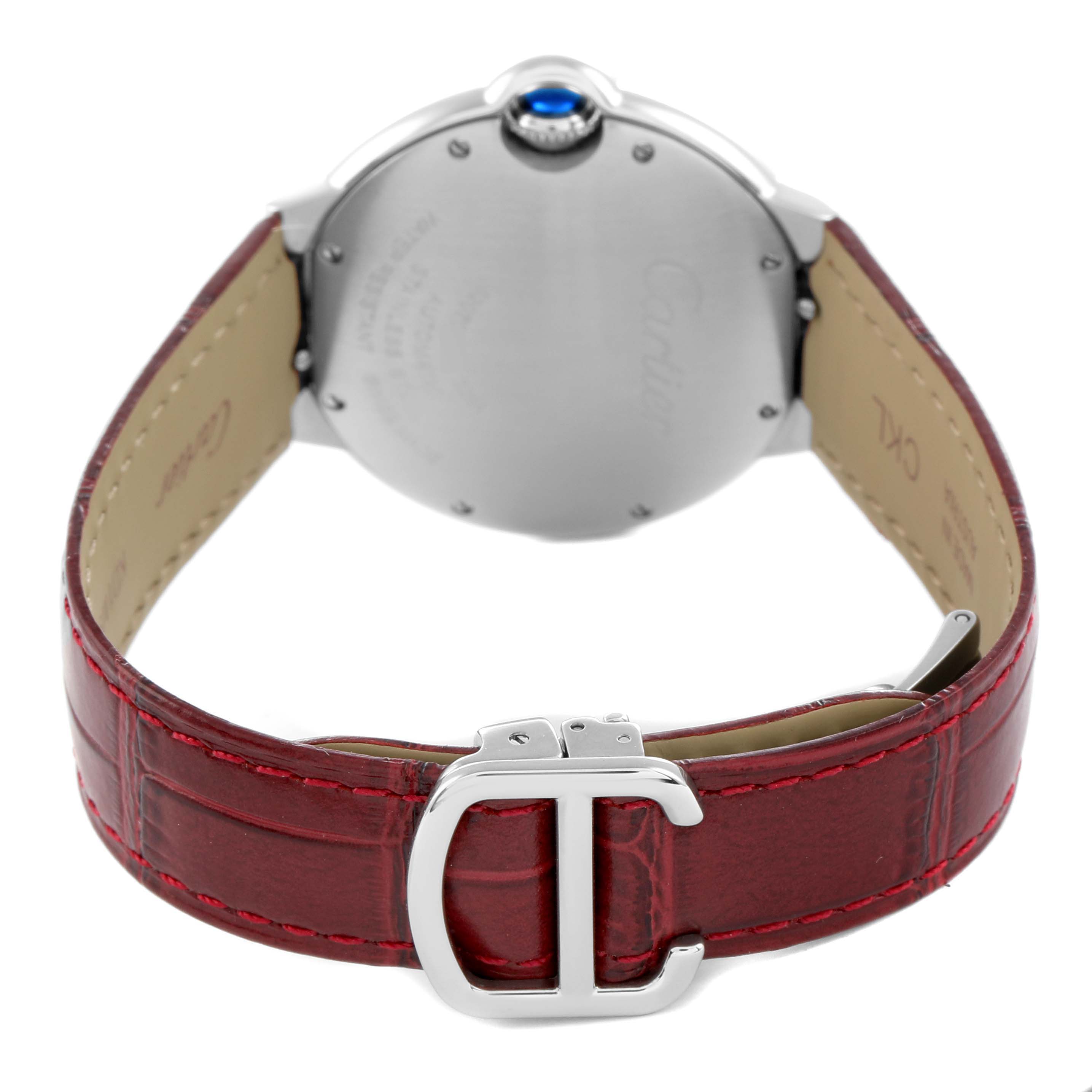 The image shows the Cartier Ballon Bleu WSBB0007 Women
s Stainless Steel Pink Dial watch from the back, highlighting the red leather strap and clasp.