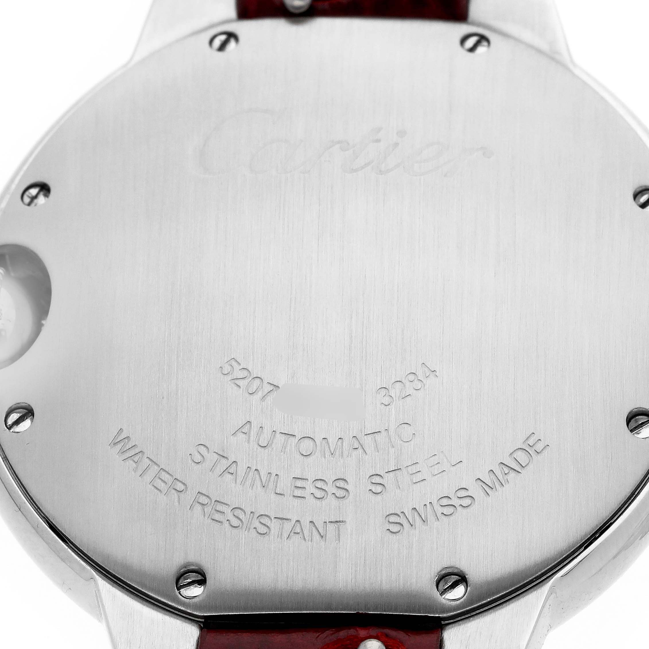 The image shows the back of the Cartier Ballon Bleu WSBB0007 Women
s Stainless Steel Pink Dial watch, featuring its stainless steel case and engraved details.