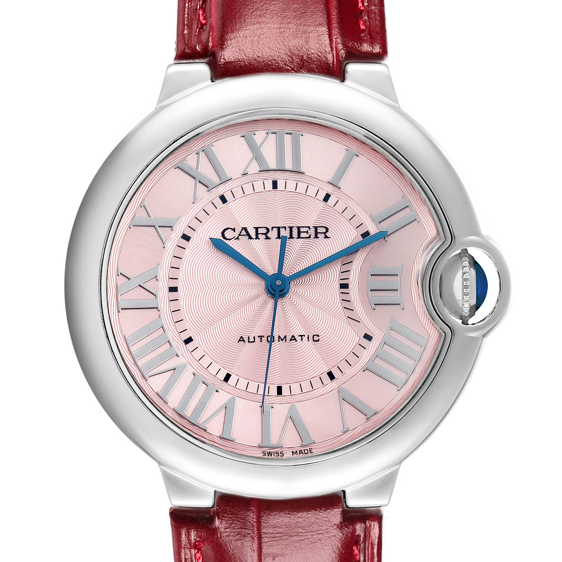 The Ballon Bleu by Cartier is shown from the front, displaying the pink dial, blue hands, Roman numerals, and a red strap.