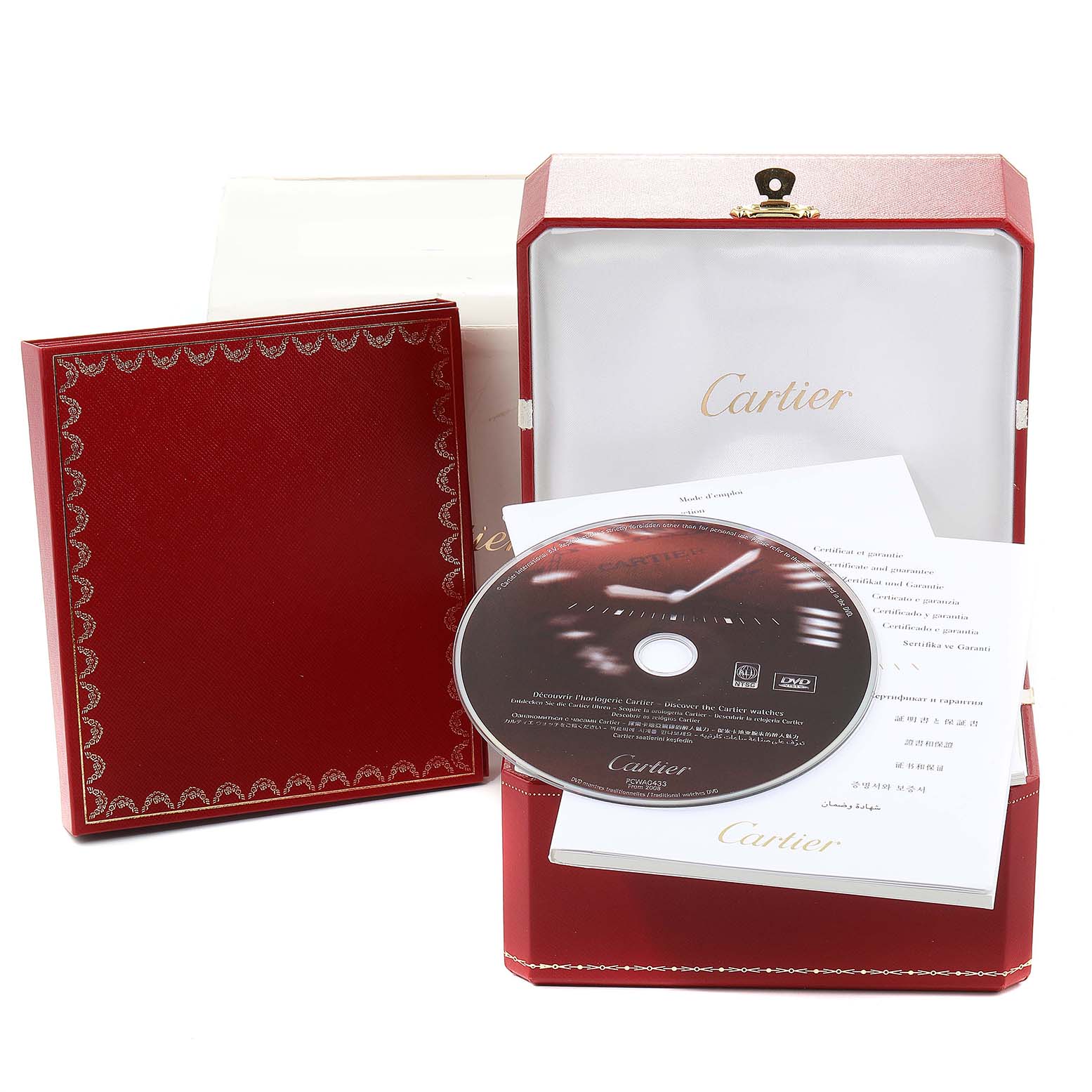 The image shows the packaging and accessories, including a DVD and documentation, for a Cartier Roadster W62020X6 Men's Stainless Steel Black Dial W62020X6 Men's Stainless Steel Black Dial model watch.