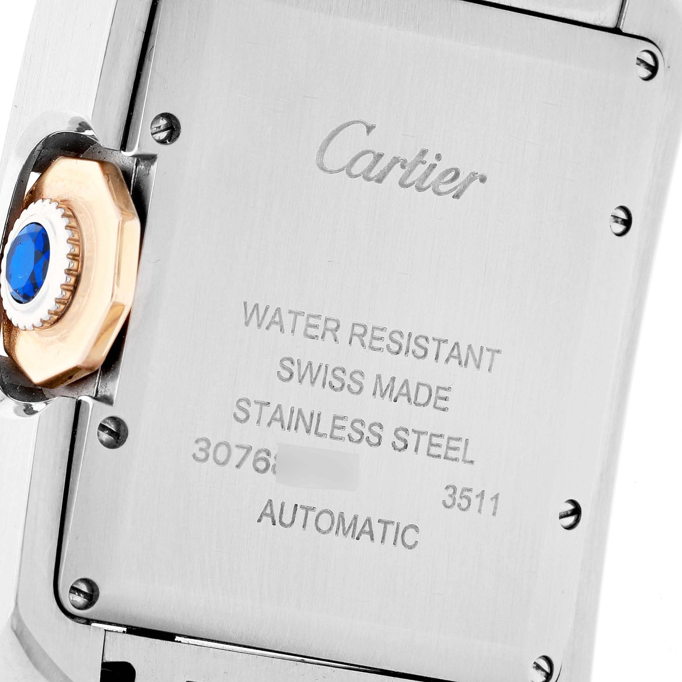 This image shows the back case and crown of the Cartier Tank Anglaise WT100025 Women's Steel and Gold (two tone) Silver Dial WT100025 Women's Steel and Gold (two tone) Silver Dial watch, displaying its water resistance, material, and automatic movement.