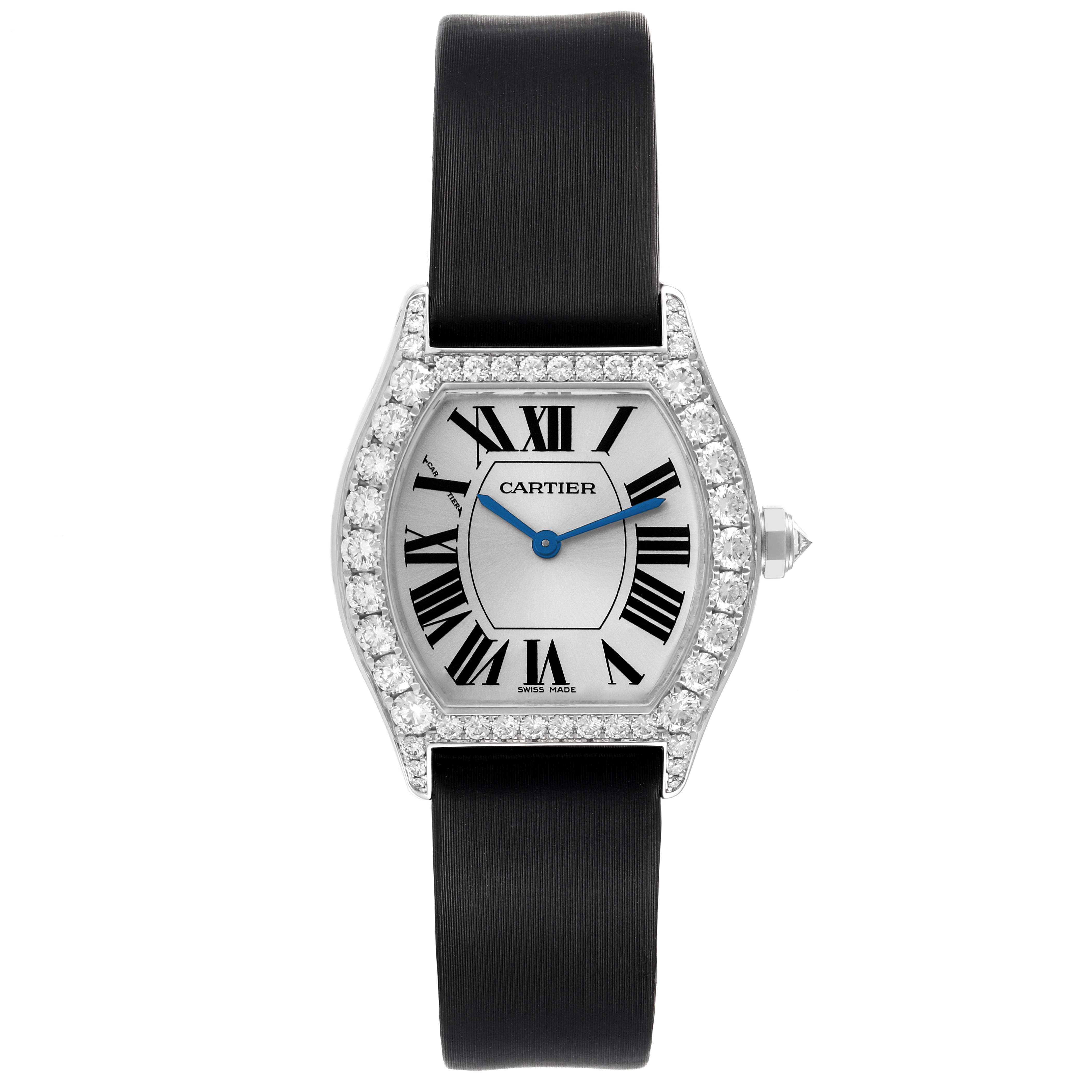 The Tortue model by Cartier is shown from the front, displaying the face, bezel, and black strap.
