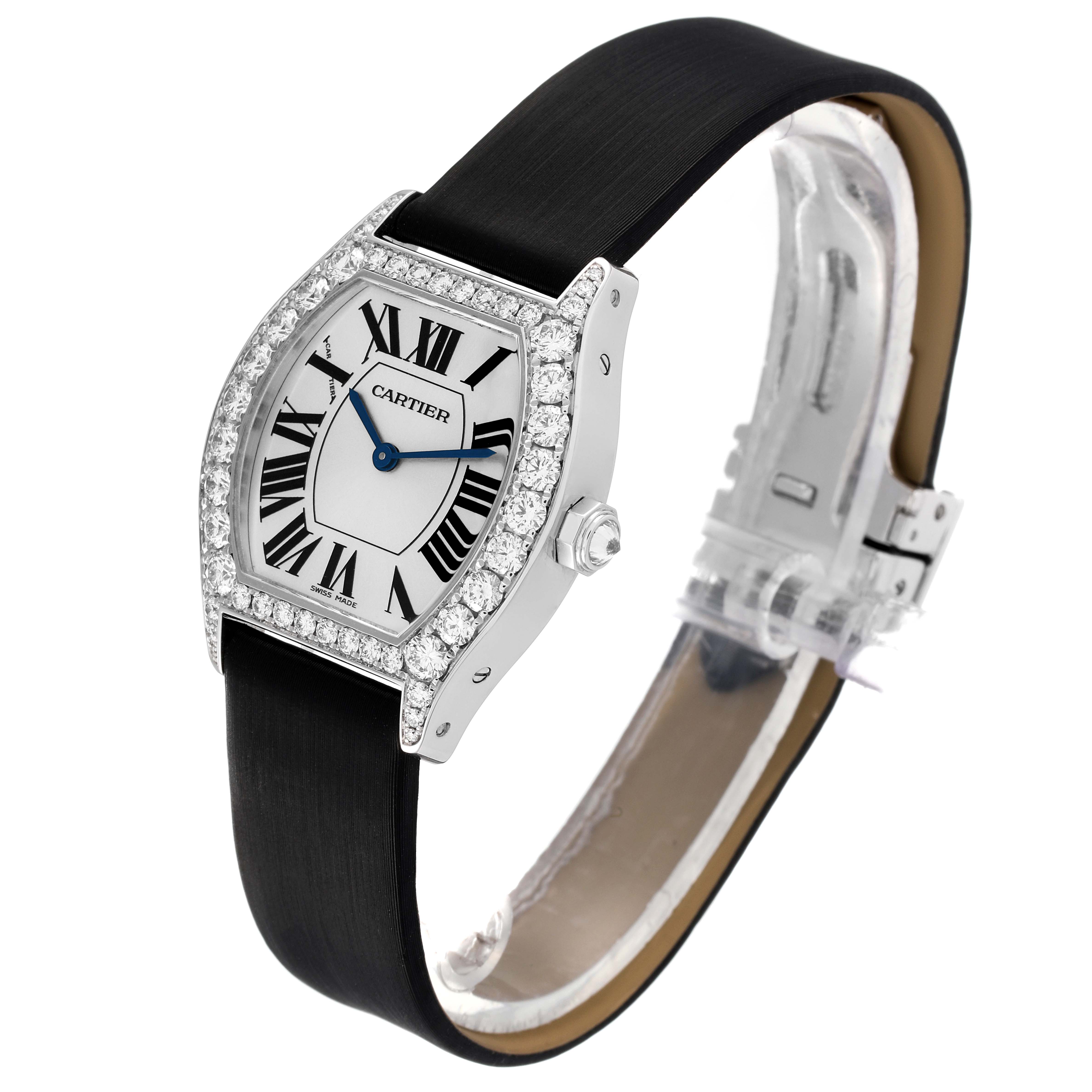 The image shows a side-angle view of the Cartier Tortue WA507231 Women's White Gold Silver Dial WA507231 Women's White Gold Silver Dial model watch, highlighting its face, bezel, and strap.