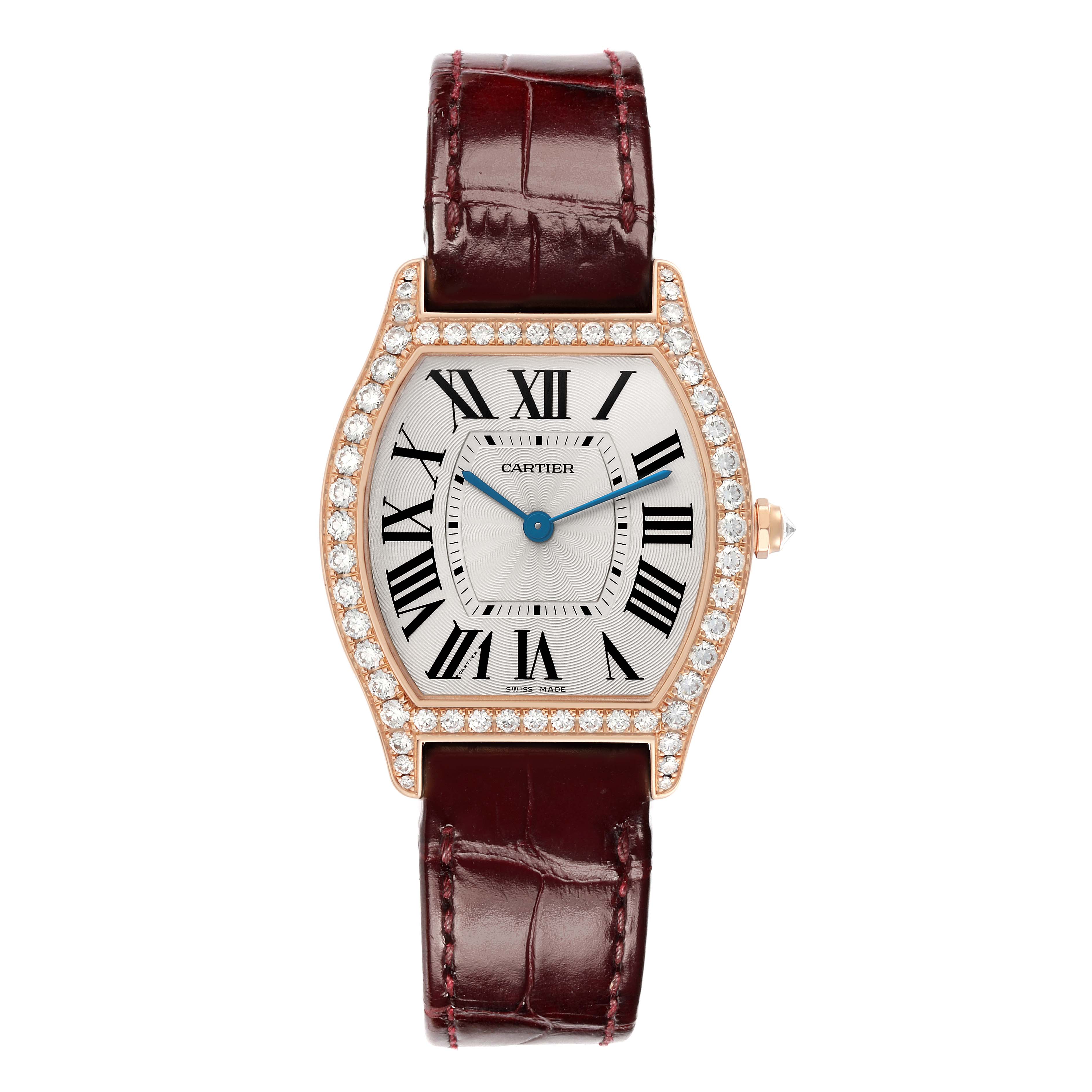 The image shows a Cartier Tortue WA501008 Women
s Rose Gold Silver Dial watch from the front, revealing its diamond-studded bezel, Roman numerals, and leather strap.