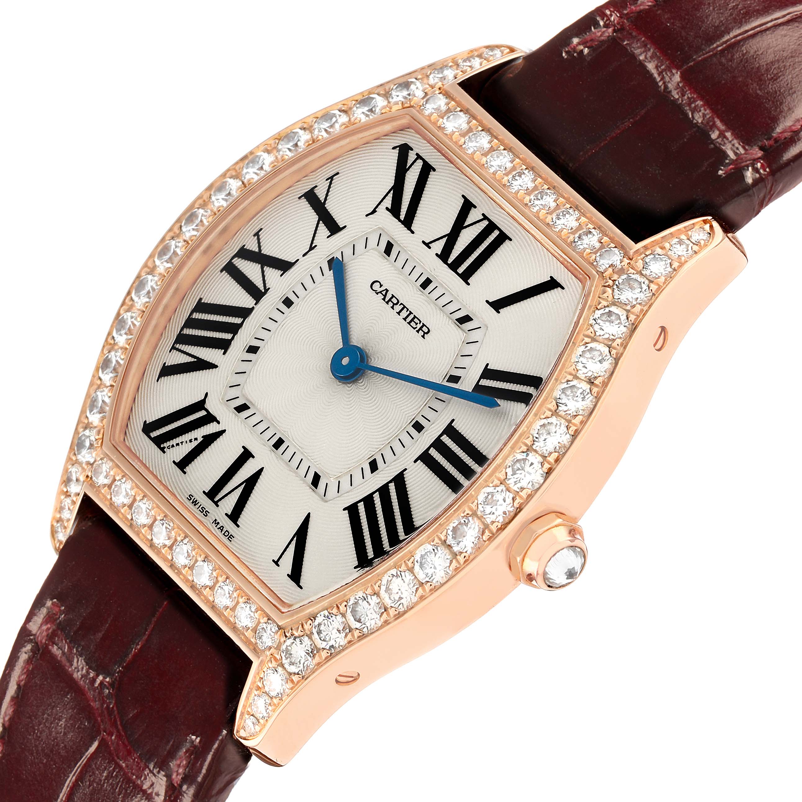 The Cartier Tortue WA501008 Women
s Rose Gold Silver Dial watch is shown at an angle highlighting its diamond-set bezel, Roman numeral dial, and brown leather strap.