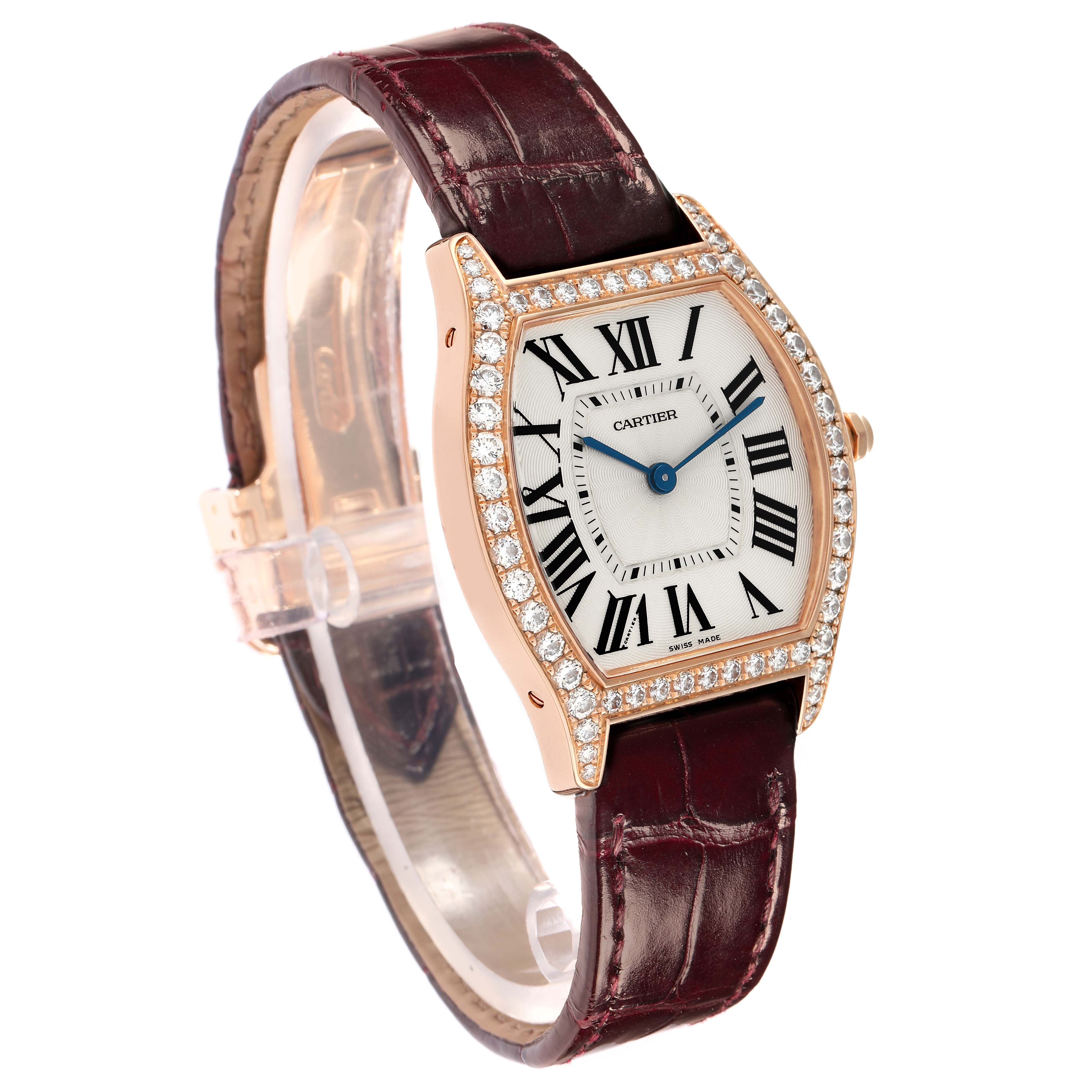 The Cartier Tortue WA501008 Women
s Rose Gold Silver Dial watch is shown from an angle highlighting the face, bezel, and strap.