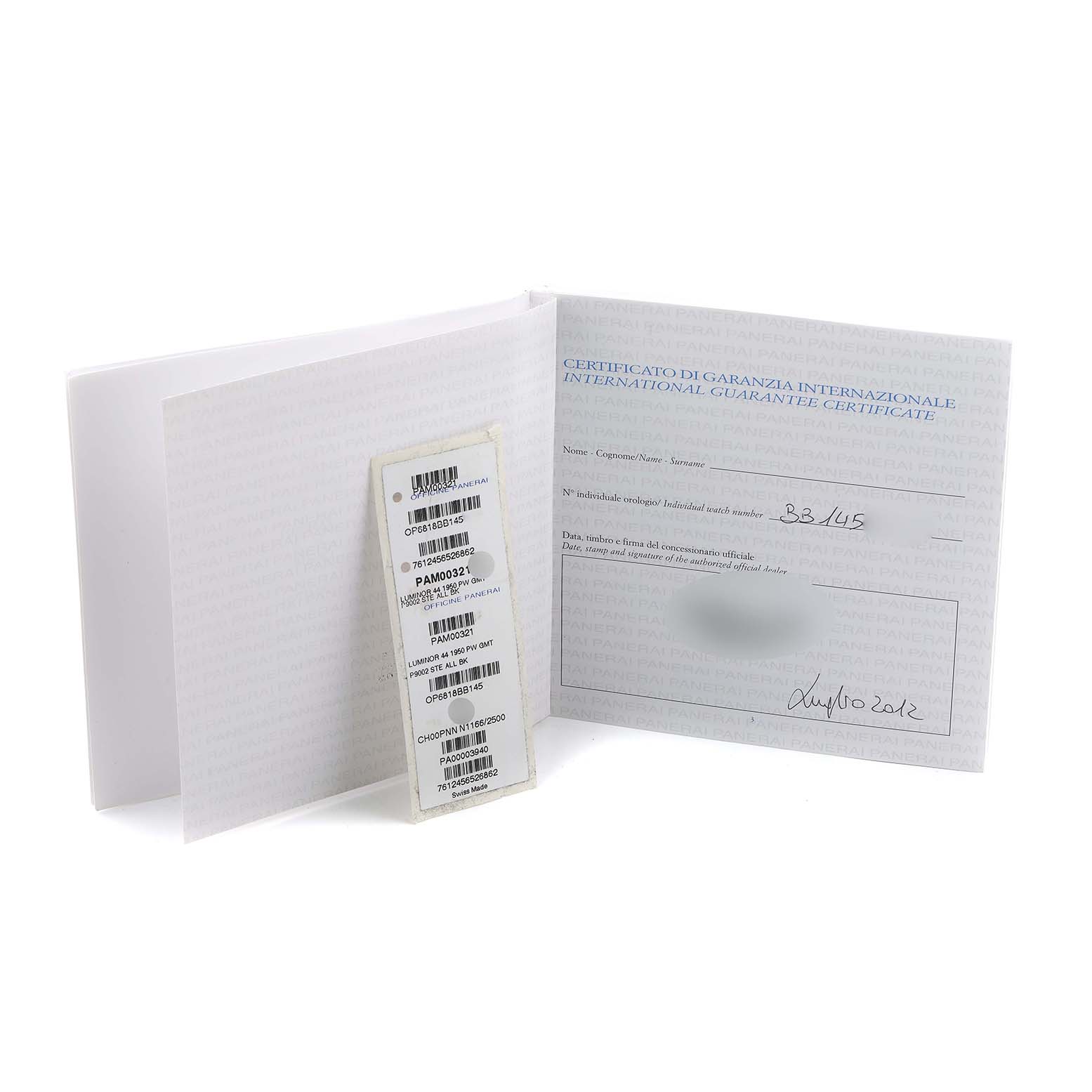 The image shows the warranty certificate and tags for a Panerai Luminor PAM00321 Men
s Stainless Steel Black Dial watch, with a focus on documentation.
