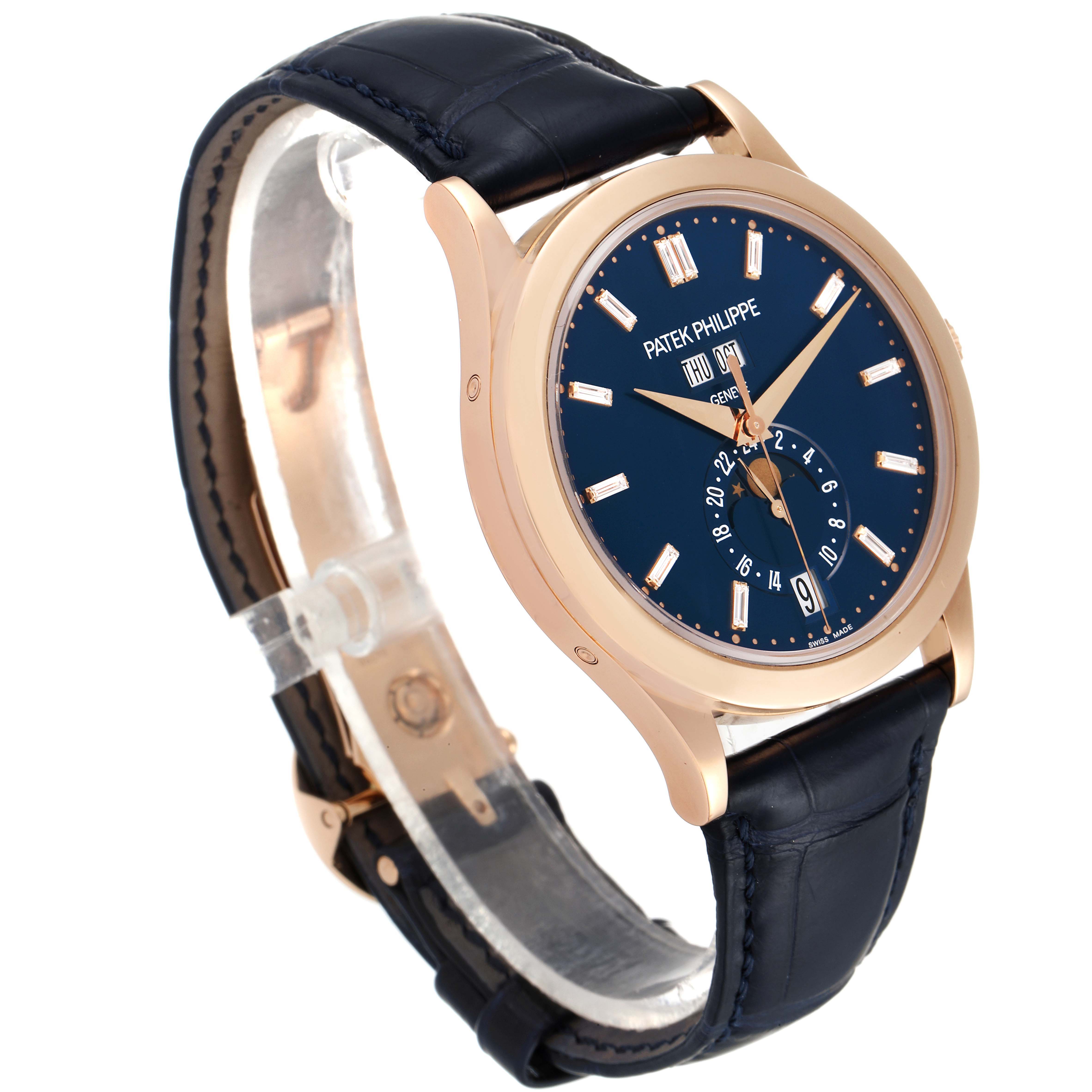 The image shows a side angle view of the Patek Philippe Complications 5396R Men's Rose Gold Blue Dial 5396R Men's Rose Gold Blue Dial watch, highlighting its blue dial, gold case, and leather strap.