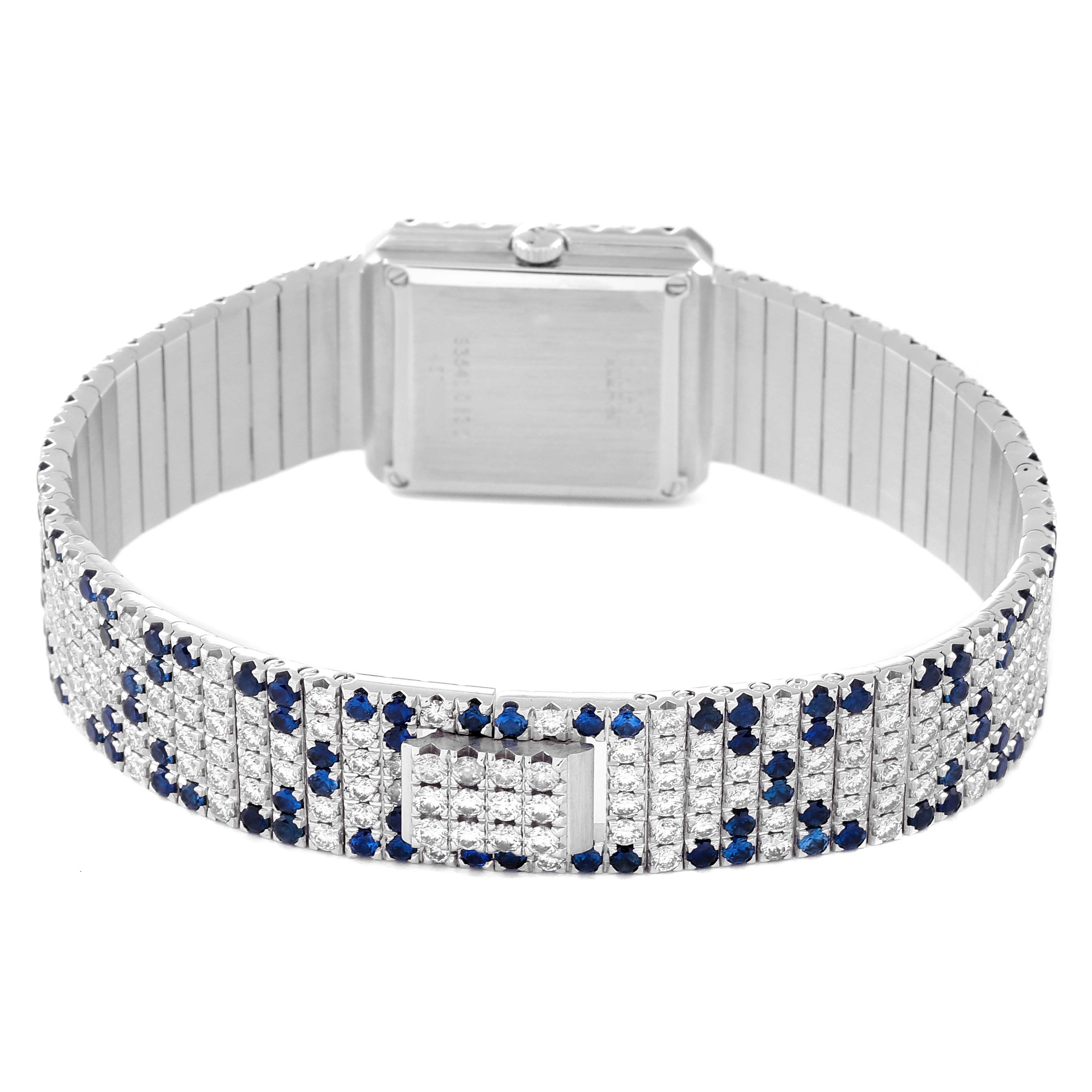 The image shows the back view of the Piaget 83541 C630 Women's White Gold Silver Dial 83541 C630 Women's White Gold Silver Dial Protocole Exceptional White Gold Pave Diamond Sapphire Ladies Watch 83541, highlighting its band and clasp.