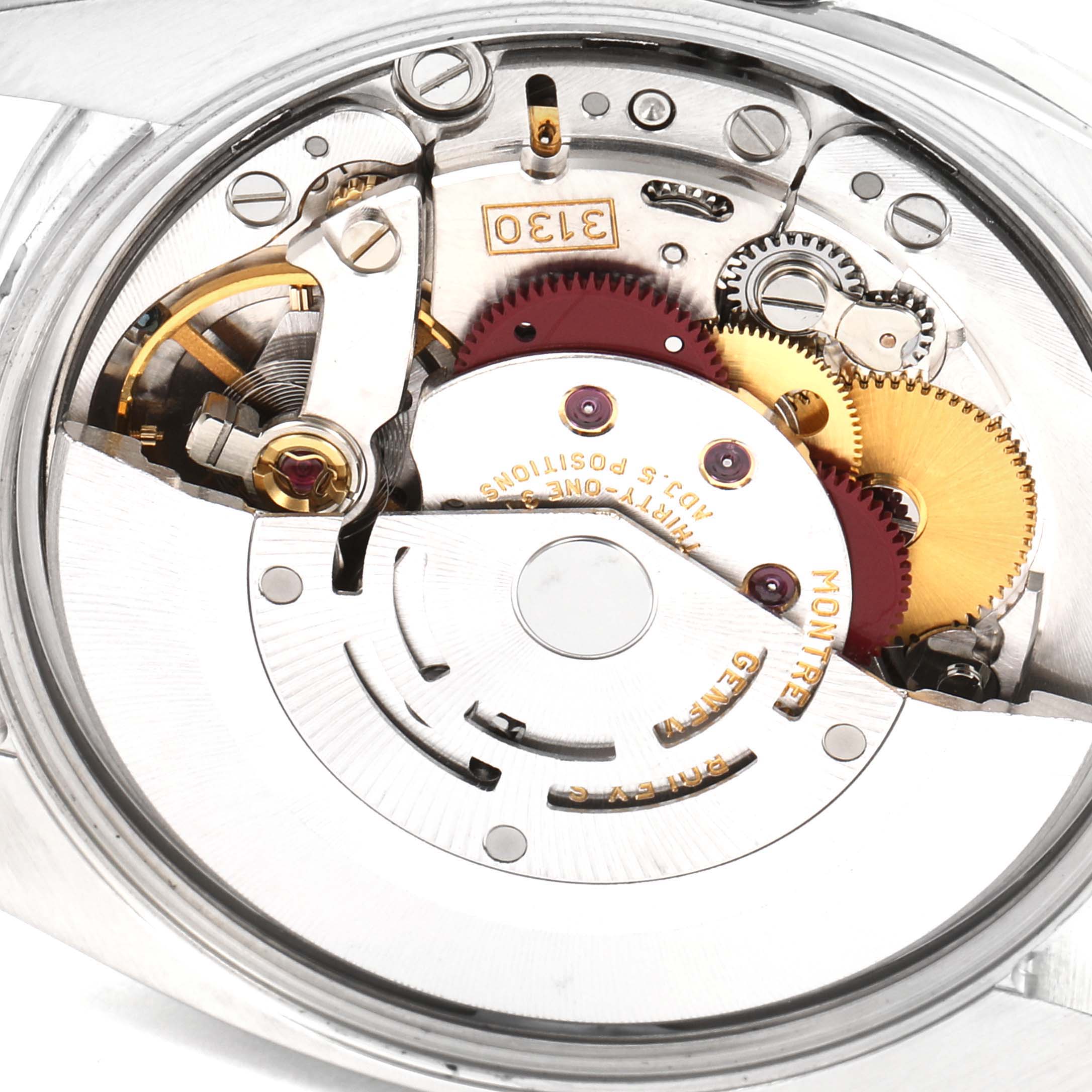 This is an internal view showing the movement mechanism of a Rolex Air-King 114210 Men's Stainless Steel White Dial 114210 Men's Stainless Steel White Dial watch.