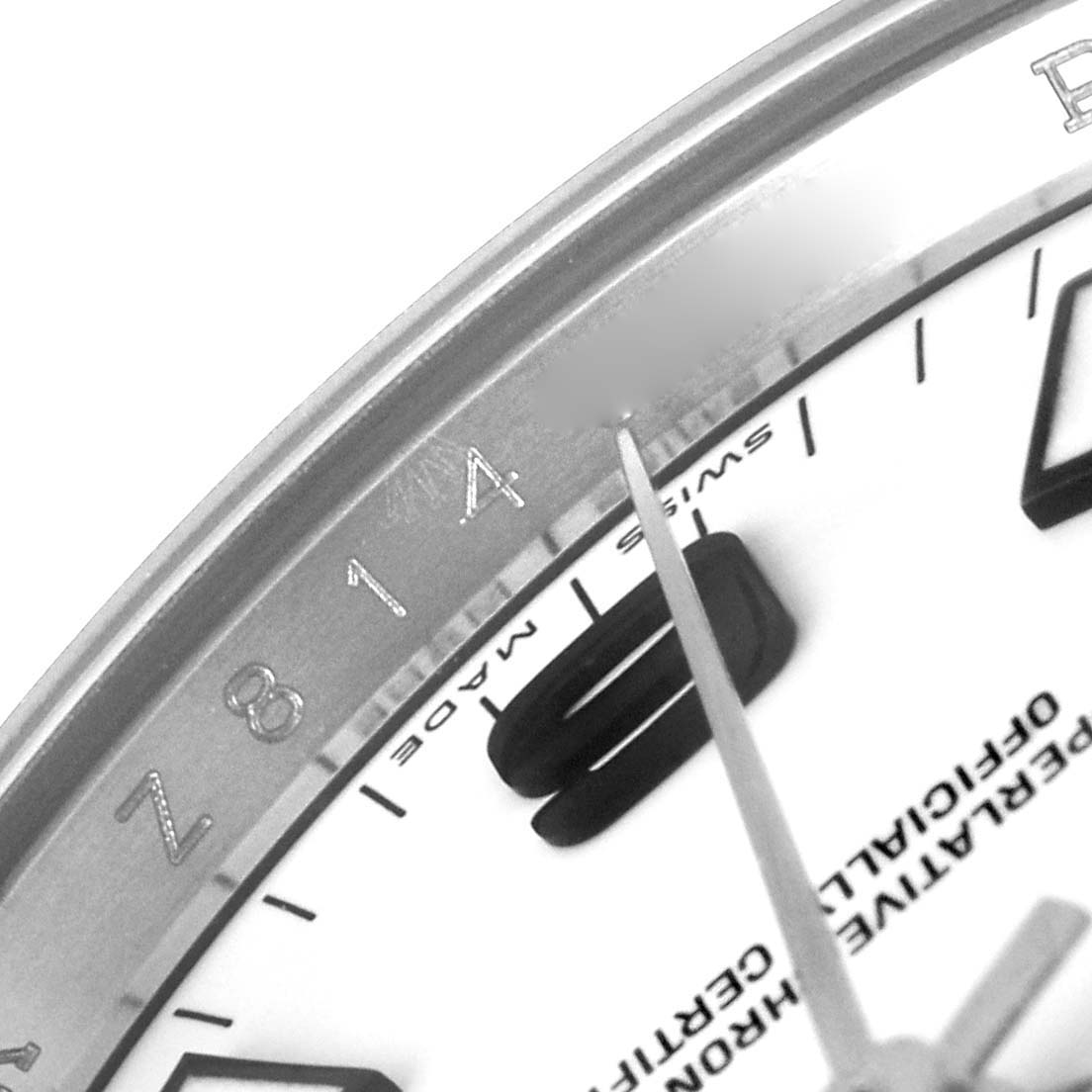 This image shows a close-up of the dial and bezel of a Rolex Air-King 114210 Men's Stainless Steel White Dial 114210 Men's Stainless Steel White Dial watch, focusing on the numerals and the second hand.