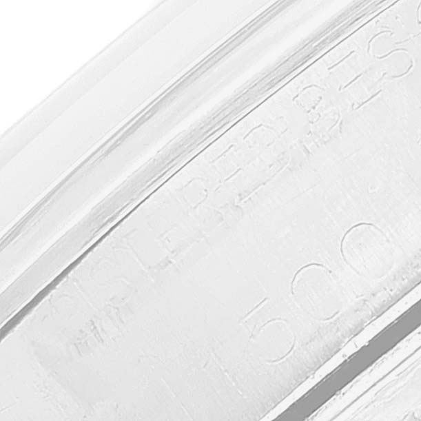 This close-up image shows the engraved details on the bezel of the Rolex Vintage Collection 1500 Men's Stainless Steel Grey Dial 1500 Men's Stainless Steel Grey Dial watch.