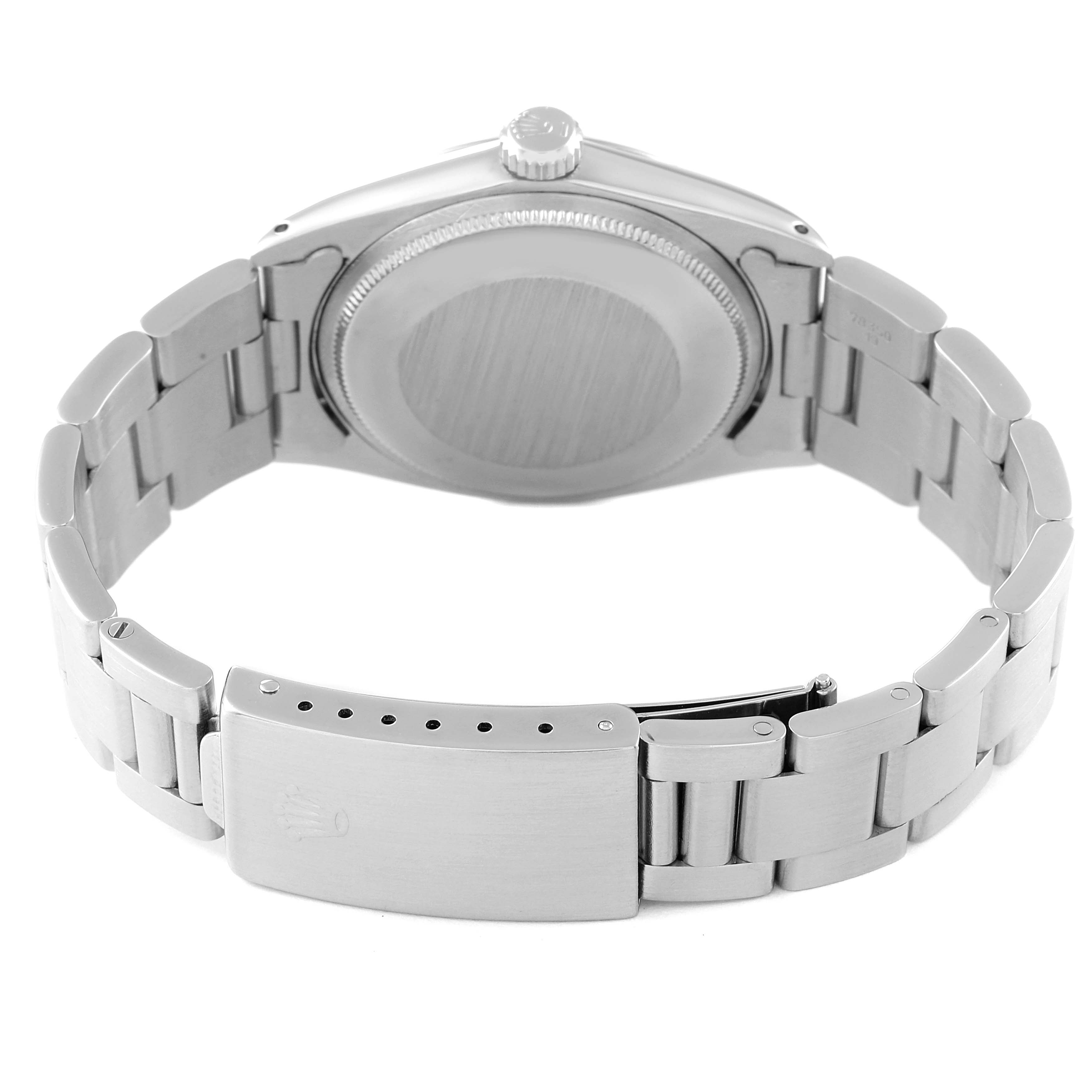 This image shows the back case and bracelet clasp of the Rolex Vintage Collection 1500 Men's Stainless Steel Grey Dial 1500 Men's Stainless Steel Grey Dial model watch from an angled rear view.