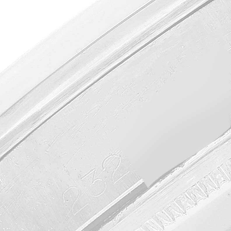 The image shows a close-up of a partial side profile of the Rolex Vintage Collection 1500 Men's Stainless Steel Grey Dial 1500 Men's Stainless Steel Grey Dial model, focusing on the serial or reference number.