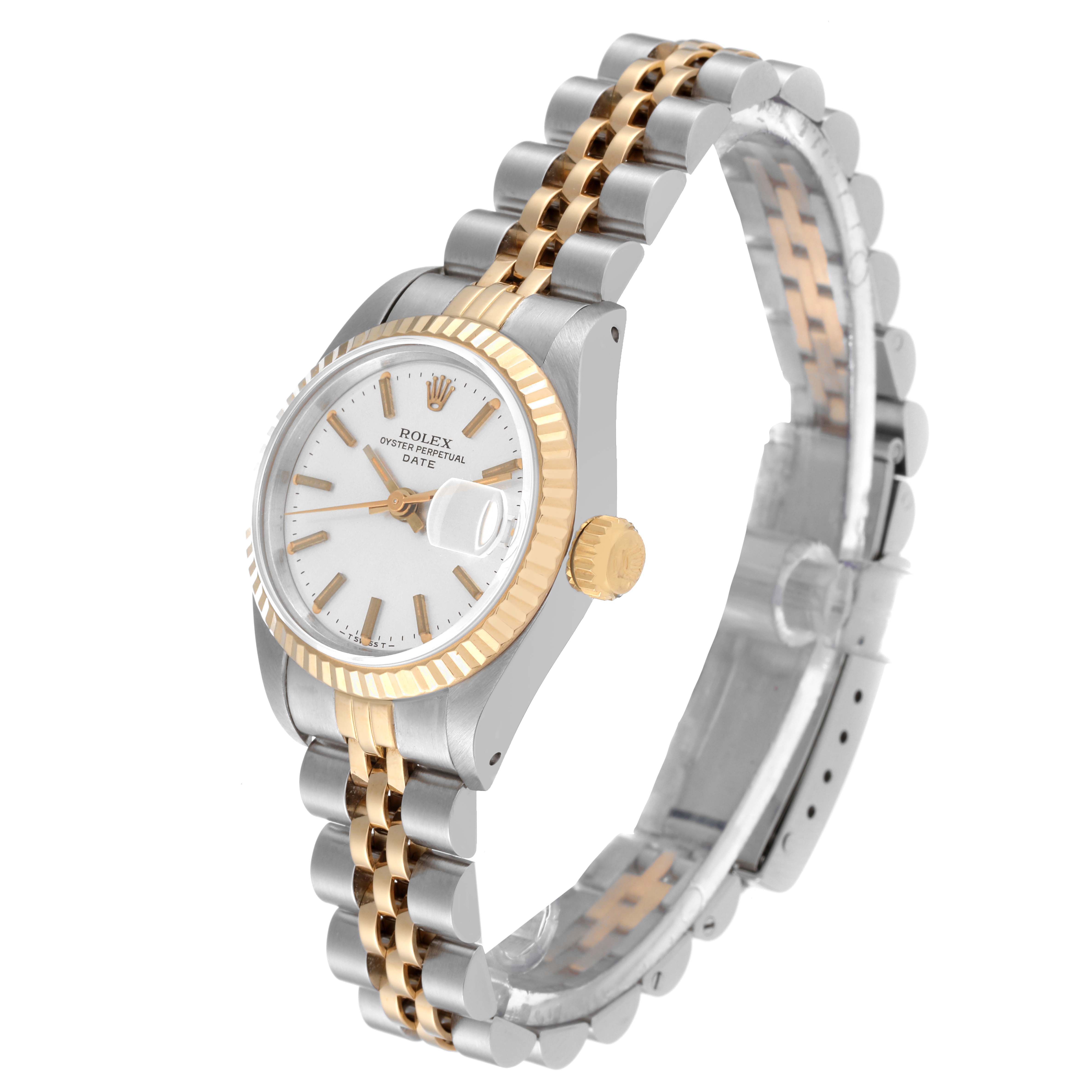 The image shows a Rolex Date 69173 Women's Steel and Gold (two tone) Silver Dial 69173 Women's Steel and Gold (two tone) Silver Dial model watch at a slight angle, highlighting its dial, fluted bezel, and two-tone bracelet.