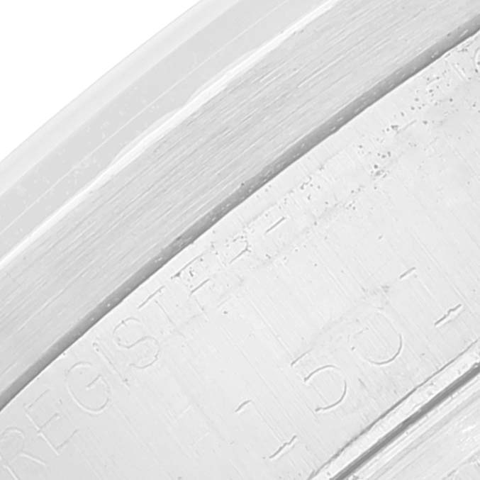 The image shows a close-up of the side engraving on the case of a Rolex Vintage Collection 1501 Men
s Stainless Steel Silver Dial 1501 Men
s Stainless Steel Silver Dial watch.