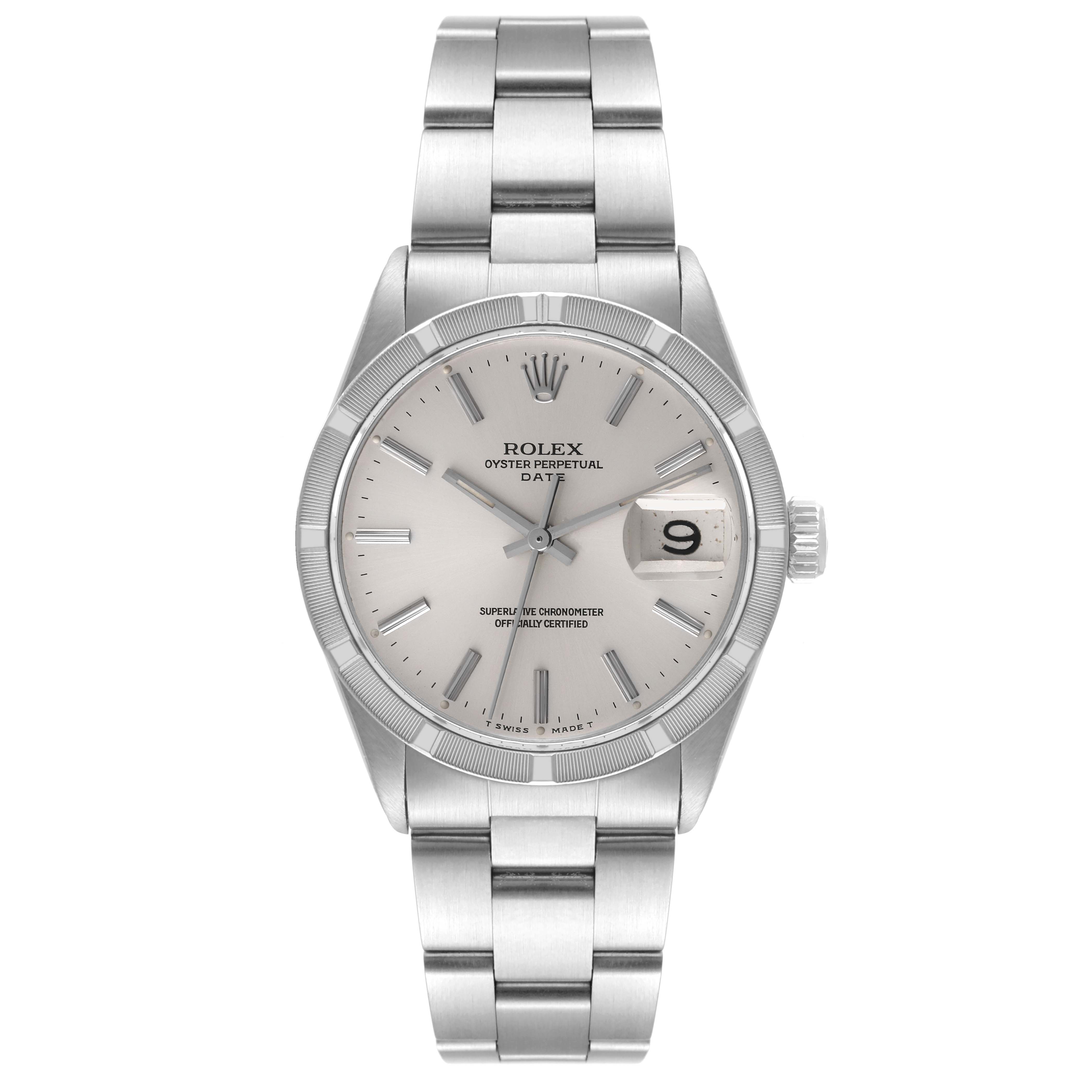 The image shows a frontal view of the Rolex Vintage Collection 1501 Men
s Stainless Steel Silver Dial 1501 Men
s Stainless Steel Silver Dial Oyster Perpetual Date watch, highlighting its dial and metal bracelet.