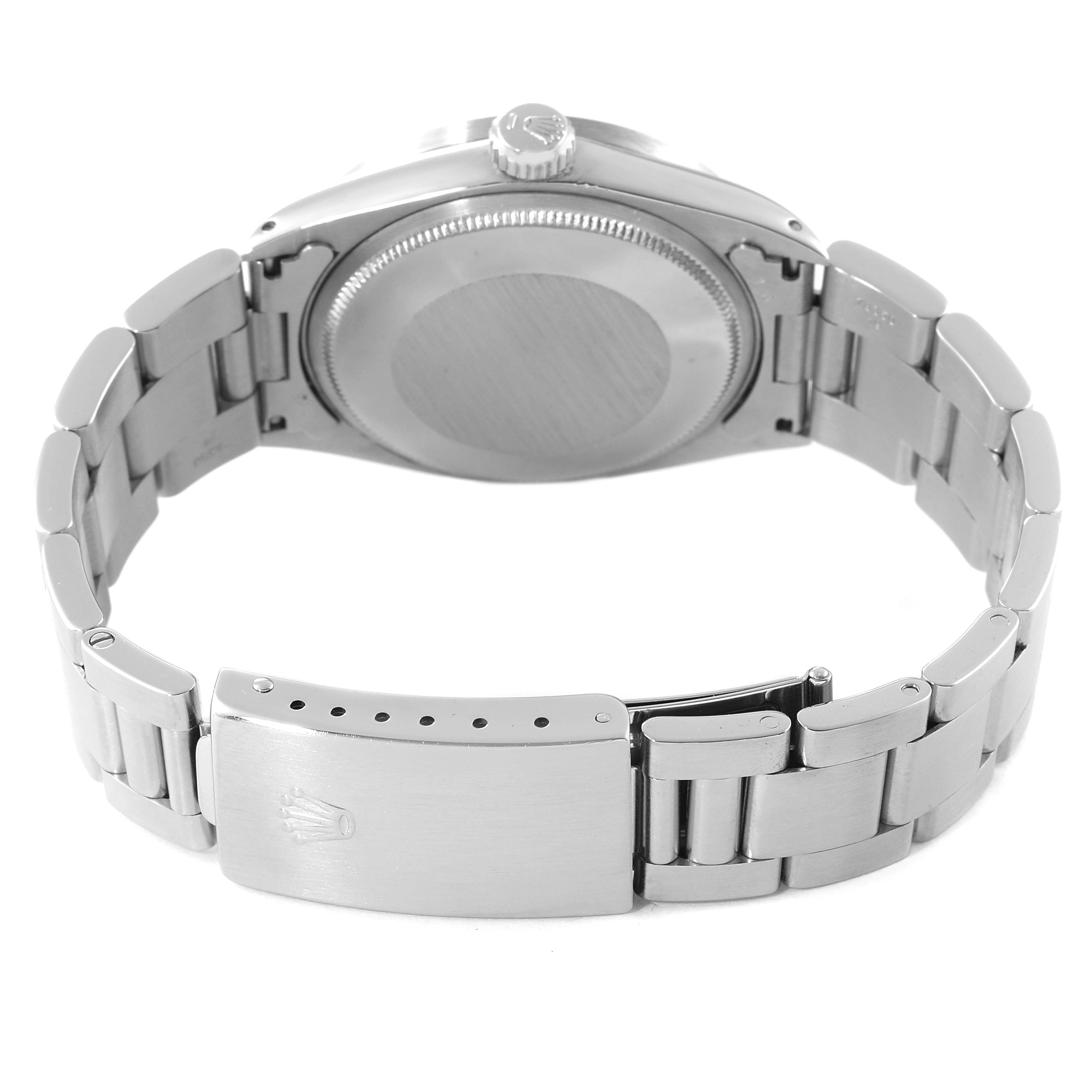 This image shows the back of the Rolex Vintage Collection 1501 Men
s Stainless Steel Silver Dial 1501 Men
s Stainless Steel Silver Dial watch, including the bracelet and clasp, with the watch face turned away.